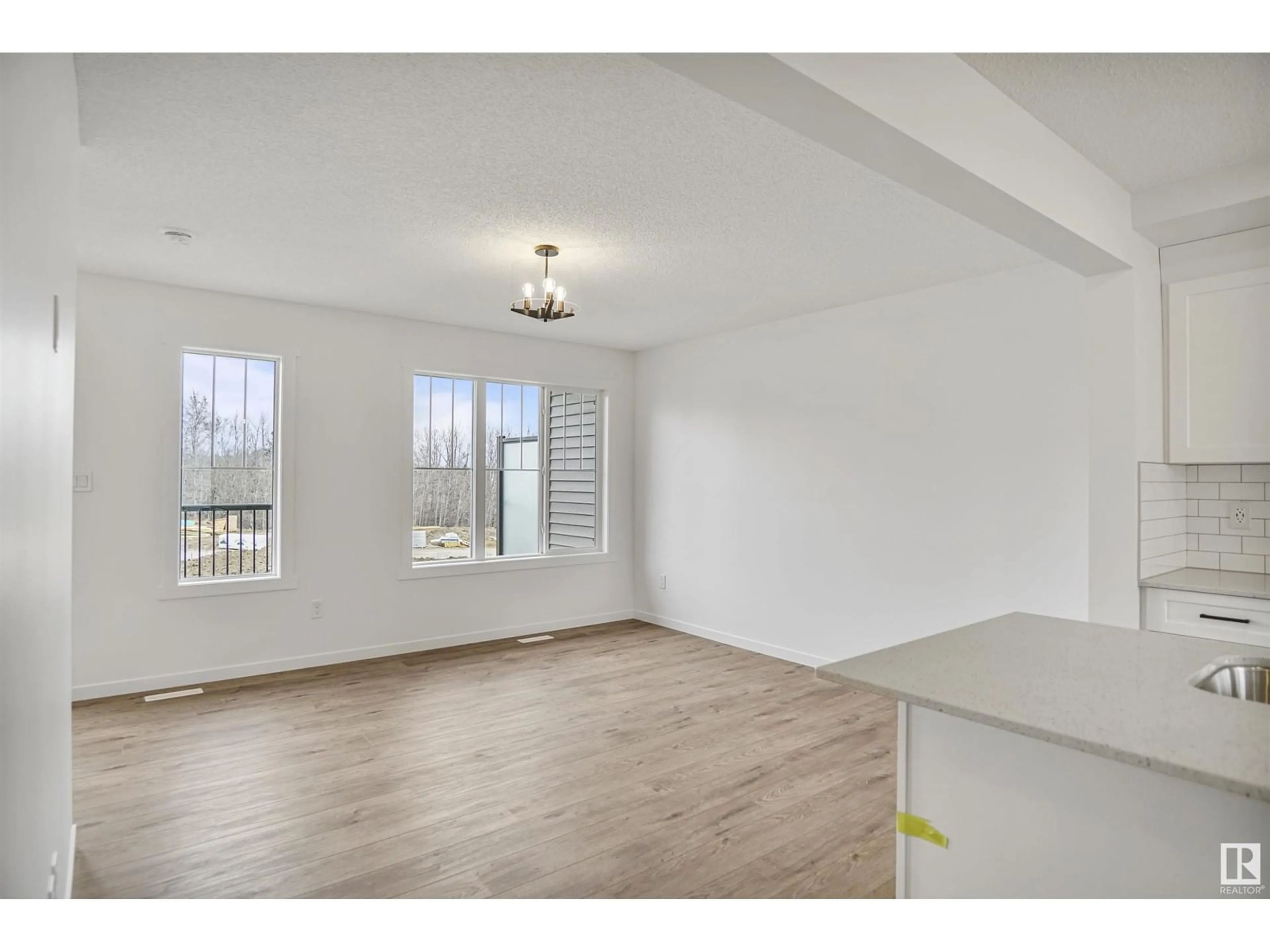 A pic of a room, wood floors for #81 50 McLaughlin DR, Spruce Grove Alberta T7X0E1