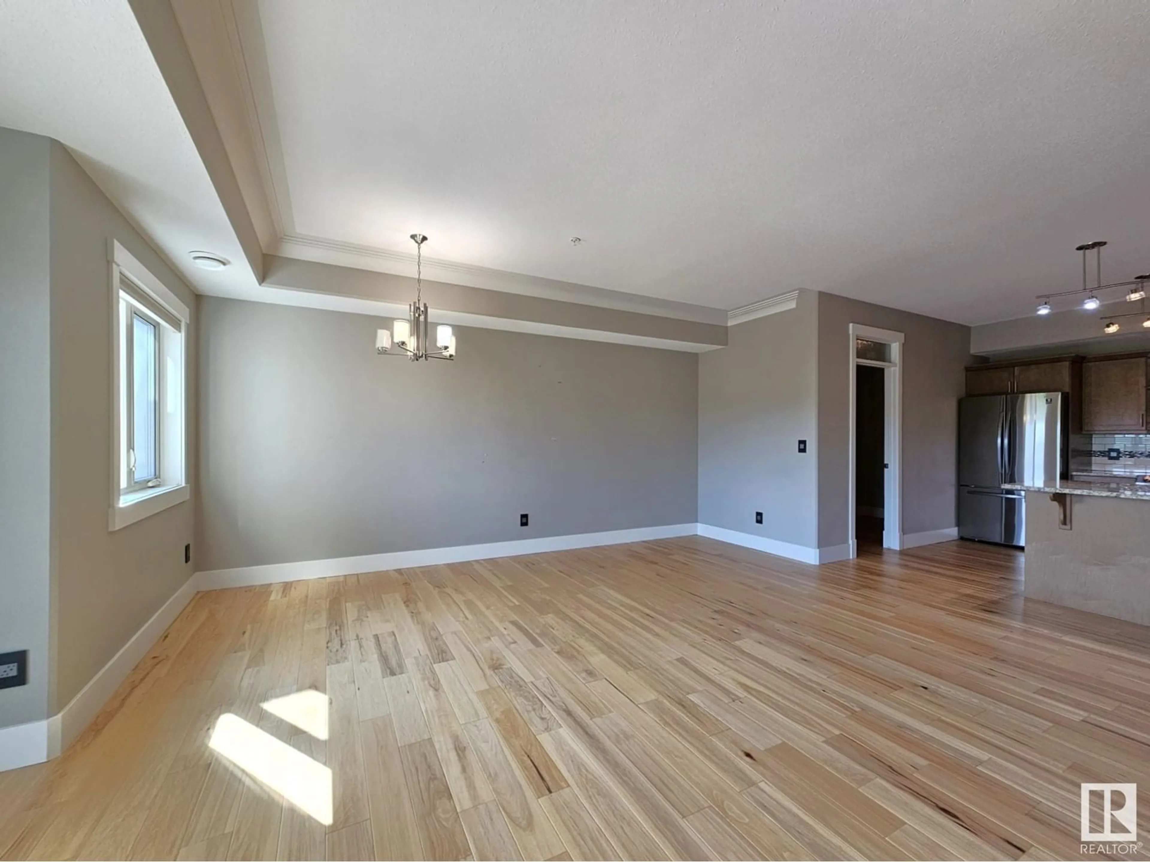 A pic of a room, wood floors for #306 5201 Brougham DR, Drayton Valley Alberta T7A0C8