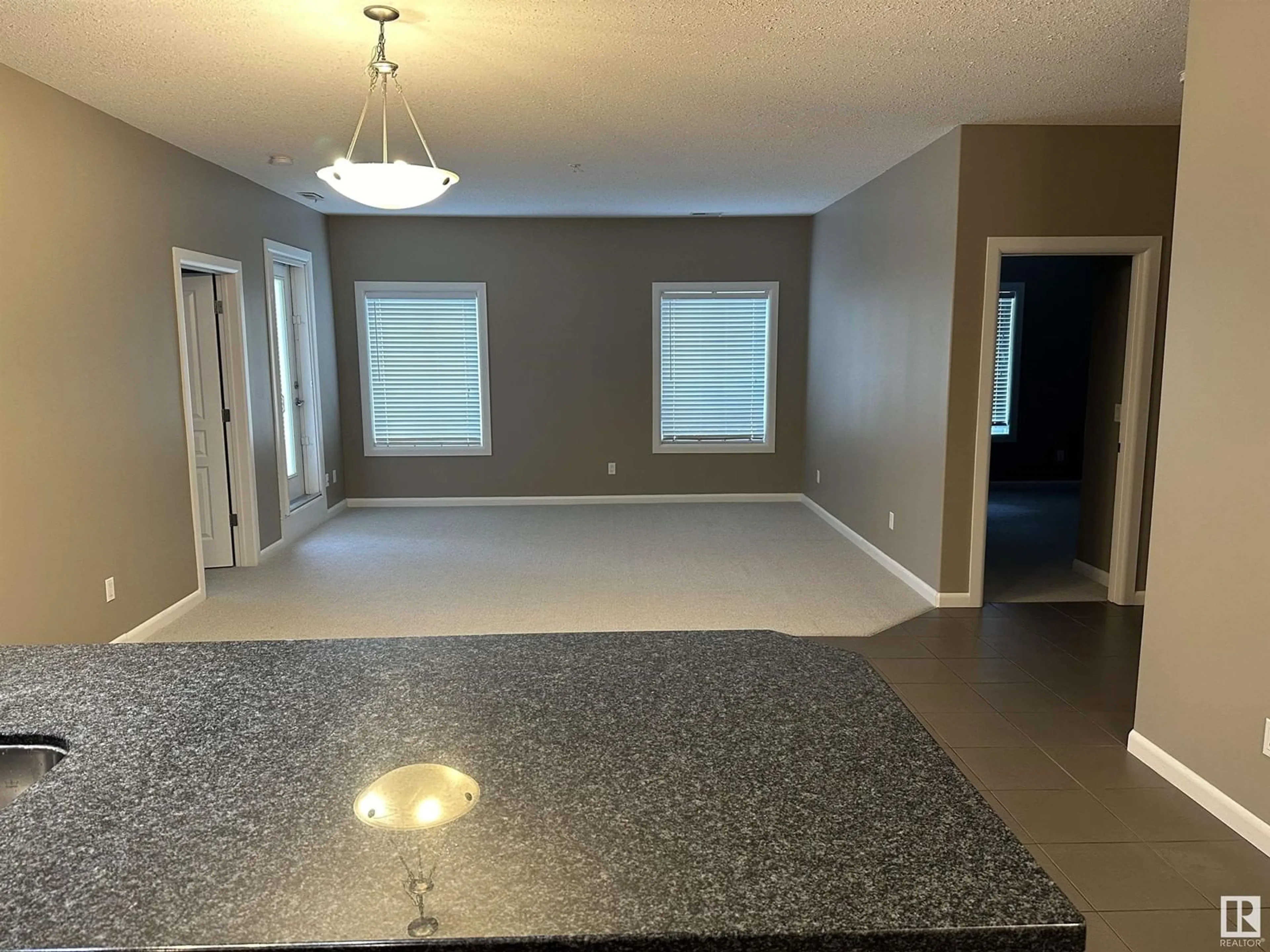 A pic of a room, cement floor for #111 160 MAGRATH RD NW NW, Edmonton Alberta T6R3T7