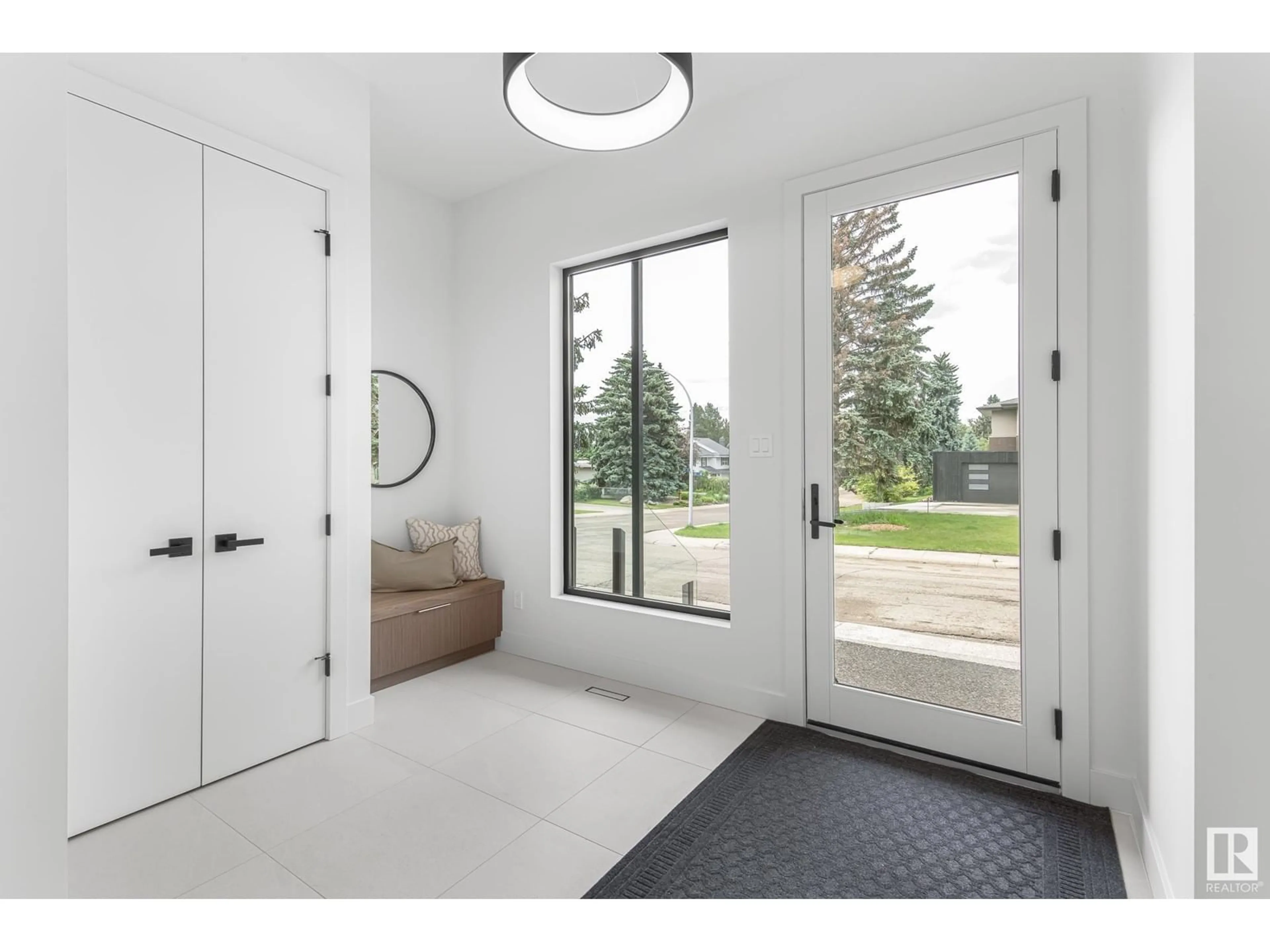 Indoor entryway for 13704 87 AV NW, Edmonton Alberta T5R0C7