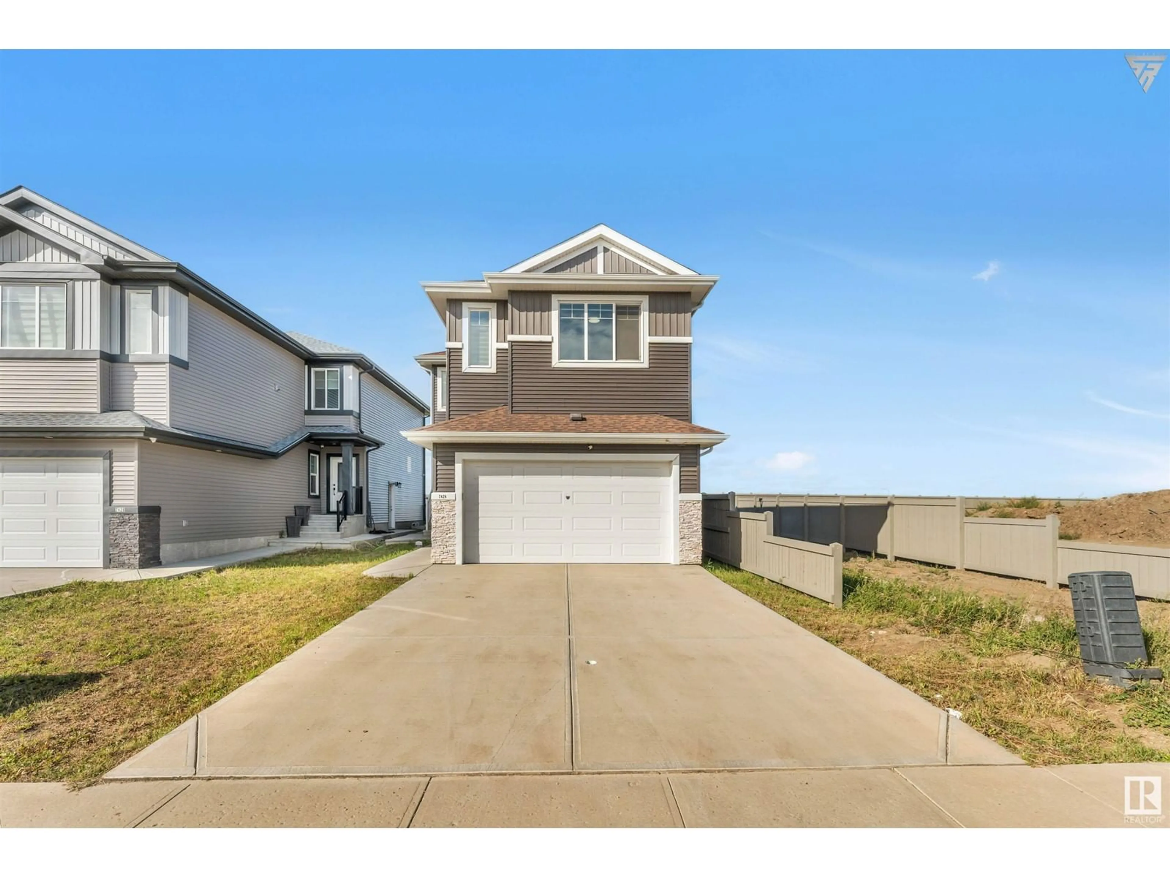 Frontside or backside of a home, the street view for 7424 182 AV NW, Edmonton Alberta T5Z0M1