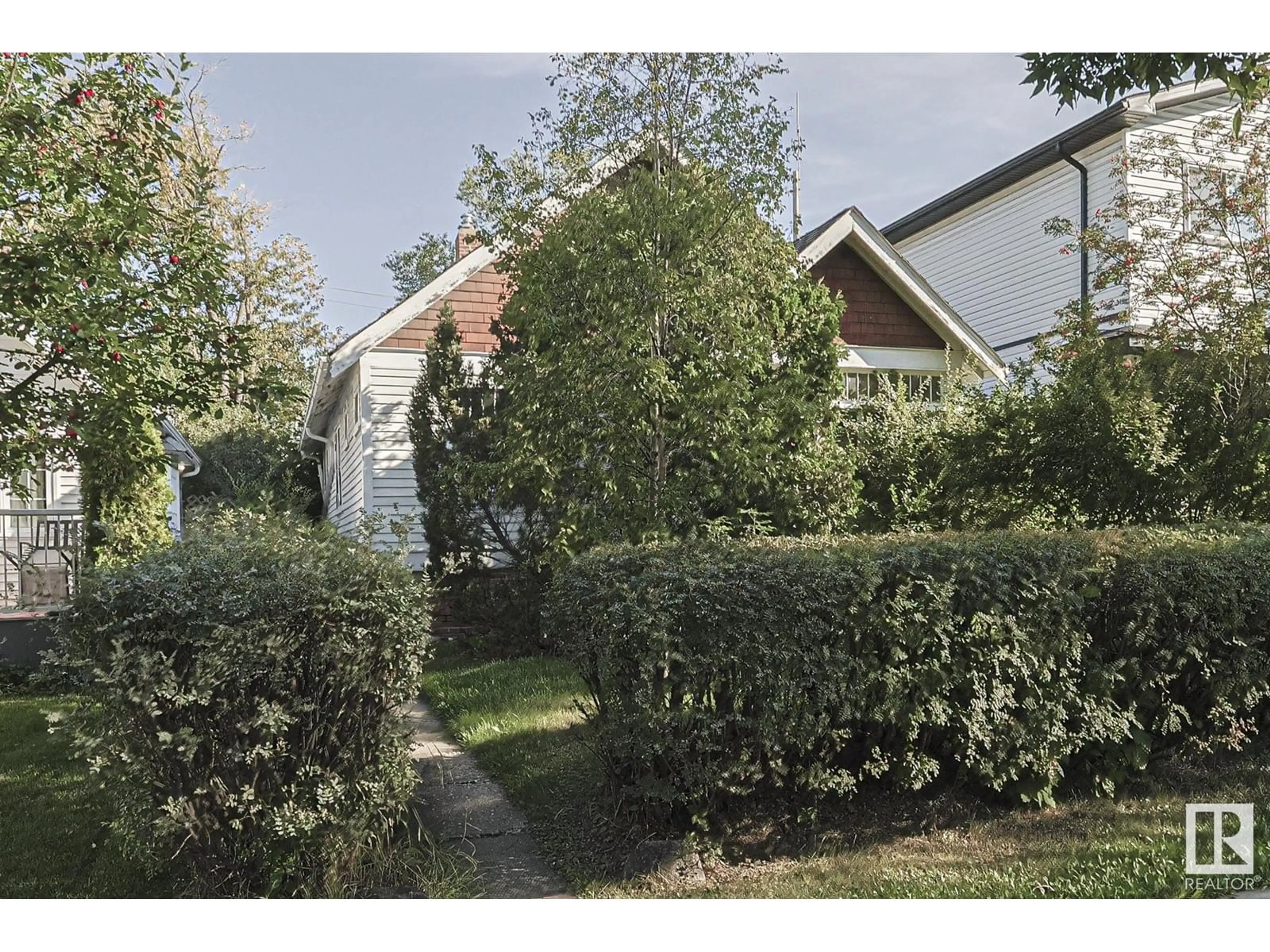 Frontside or backside of a home, the street view for 10806 75 AV NW, Edmonton Alberta T5W0B8