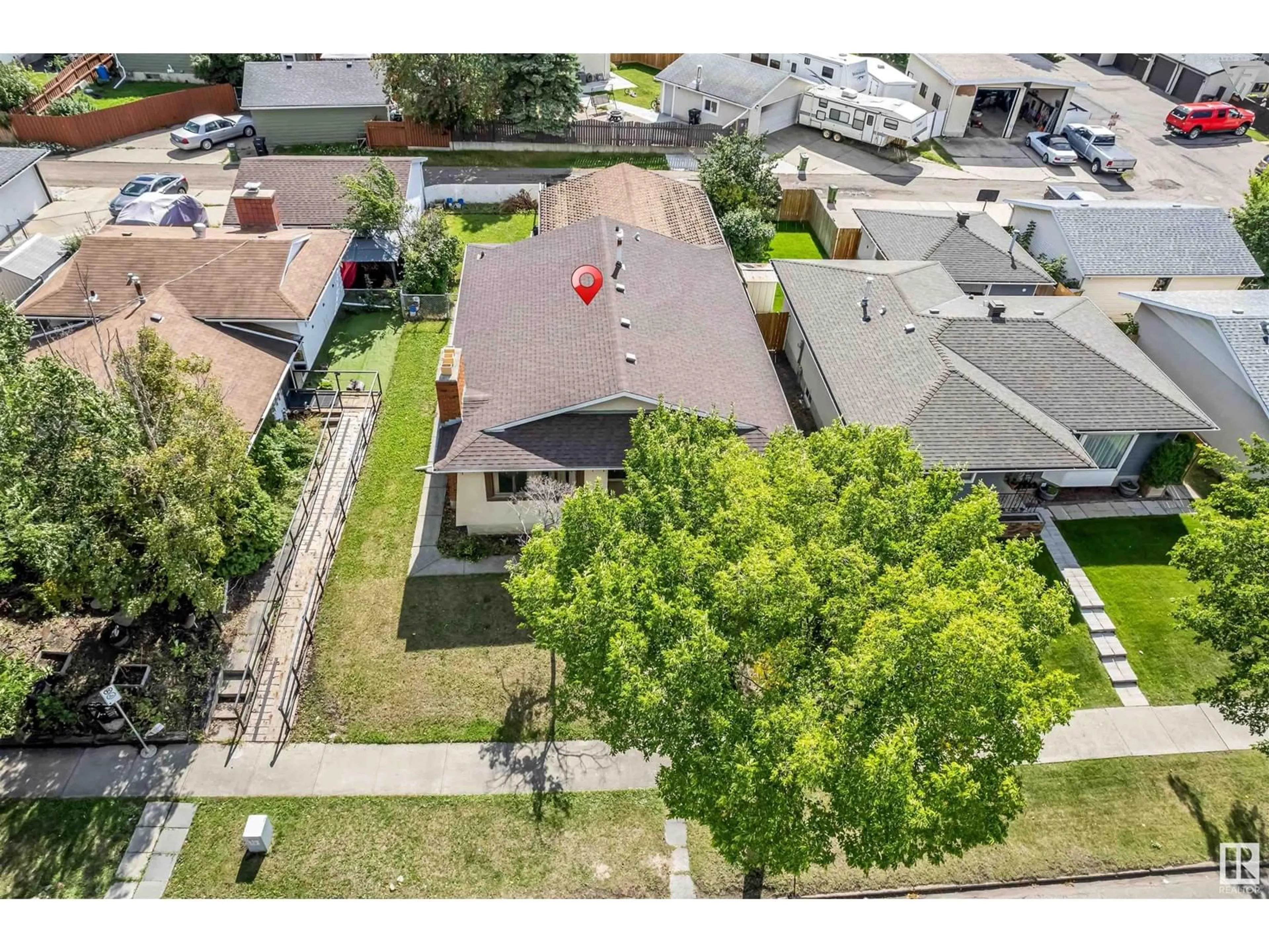 Frontside or backside of a home, the street view for 11731 145 AV NW NW, Edmonton Alberta T5X1M2