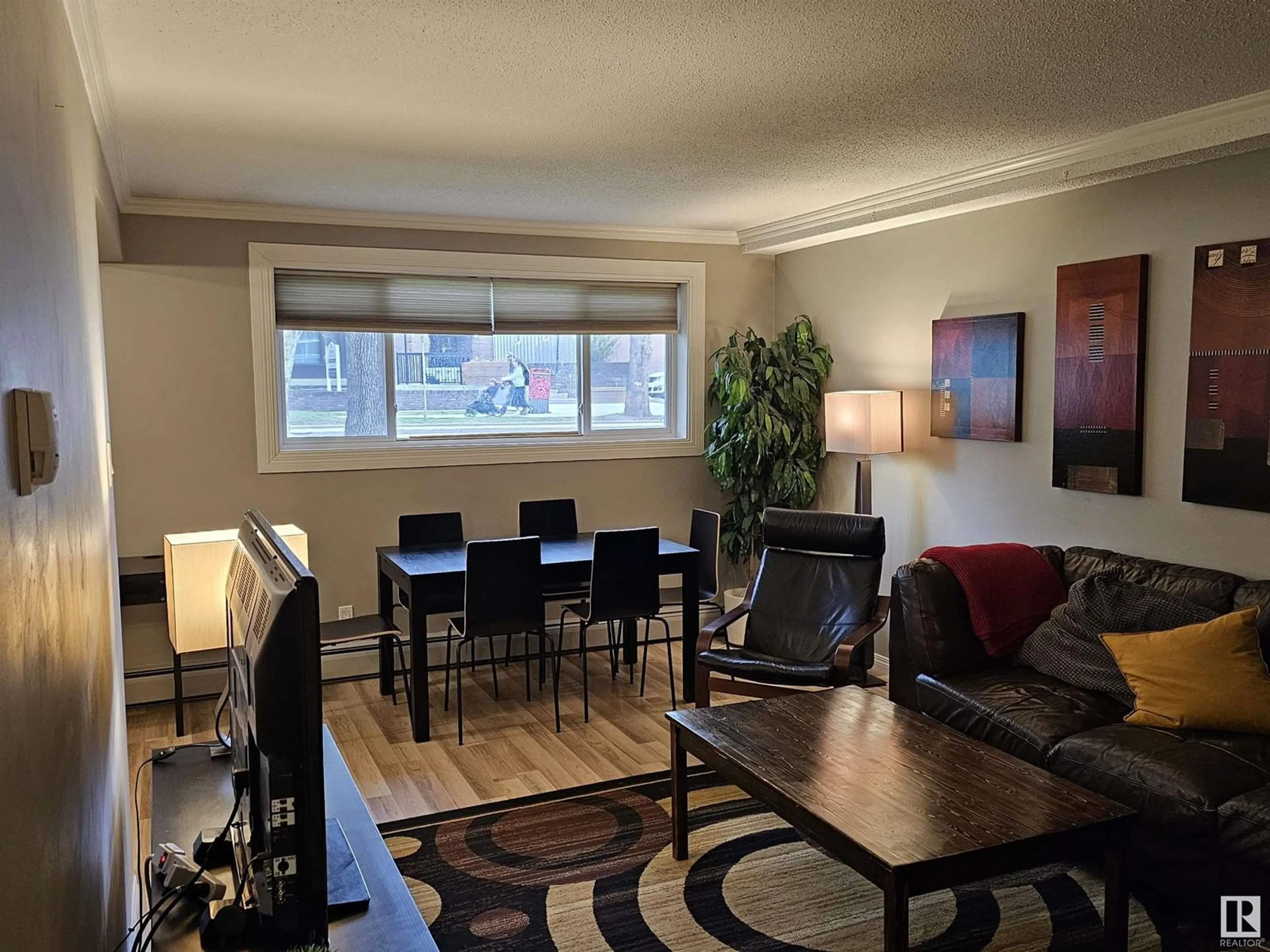 Living room for #104 9925 83 AV NW, Edmonton Alberta T6E2B9