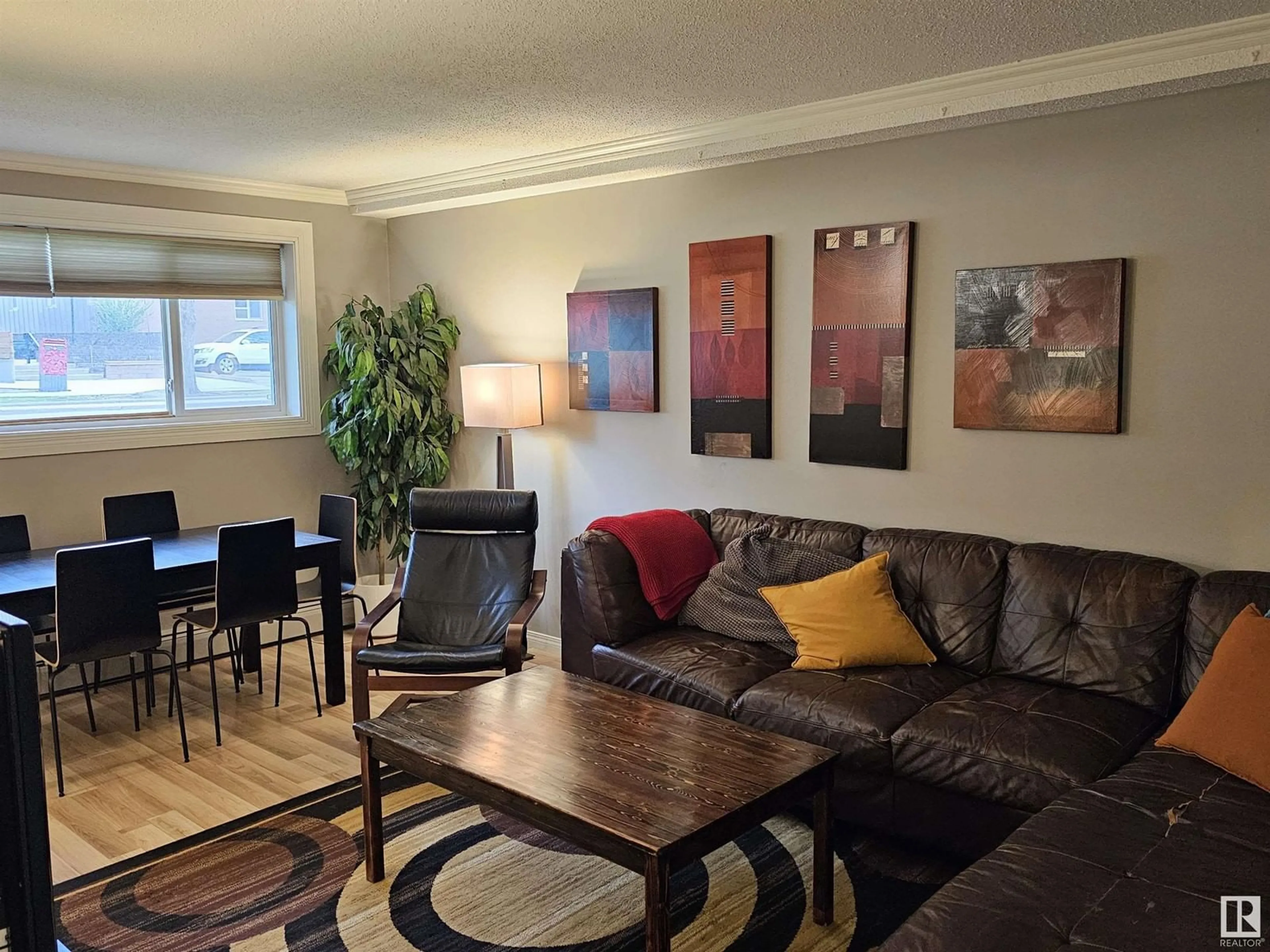 Living room, wood floors for #104 9925 83 AV NW, Edmonton Alberta T6E2B9