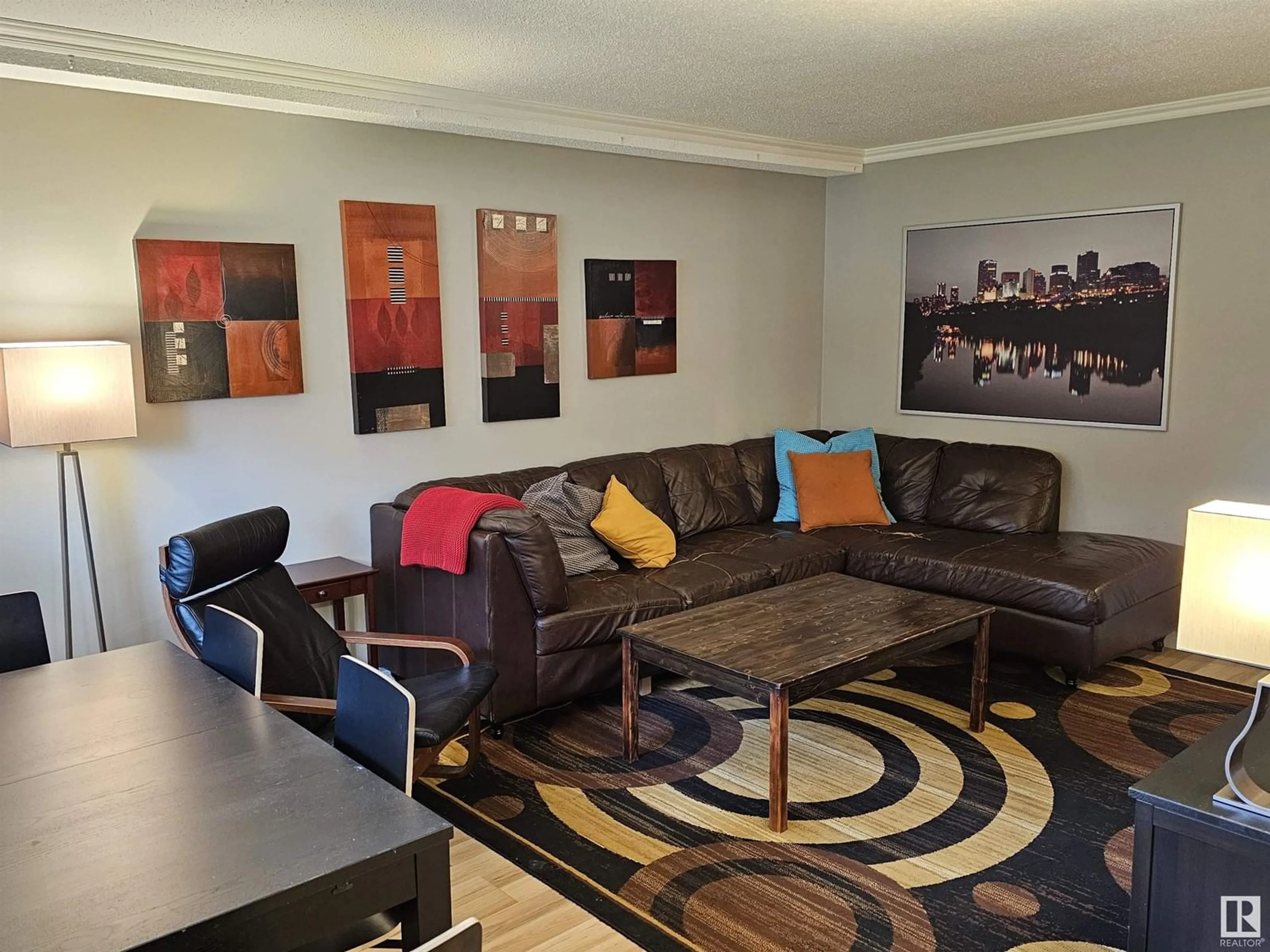 Living room, wood floors for #104 9925 83 AV NW, Edmonton Alberta T6E2B9