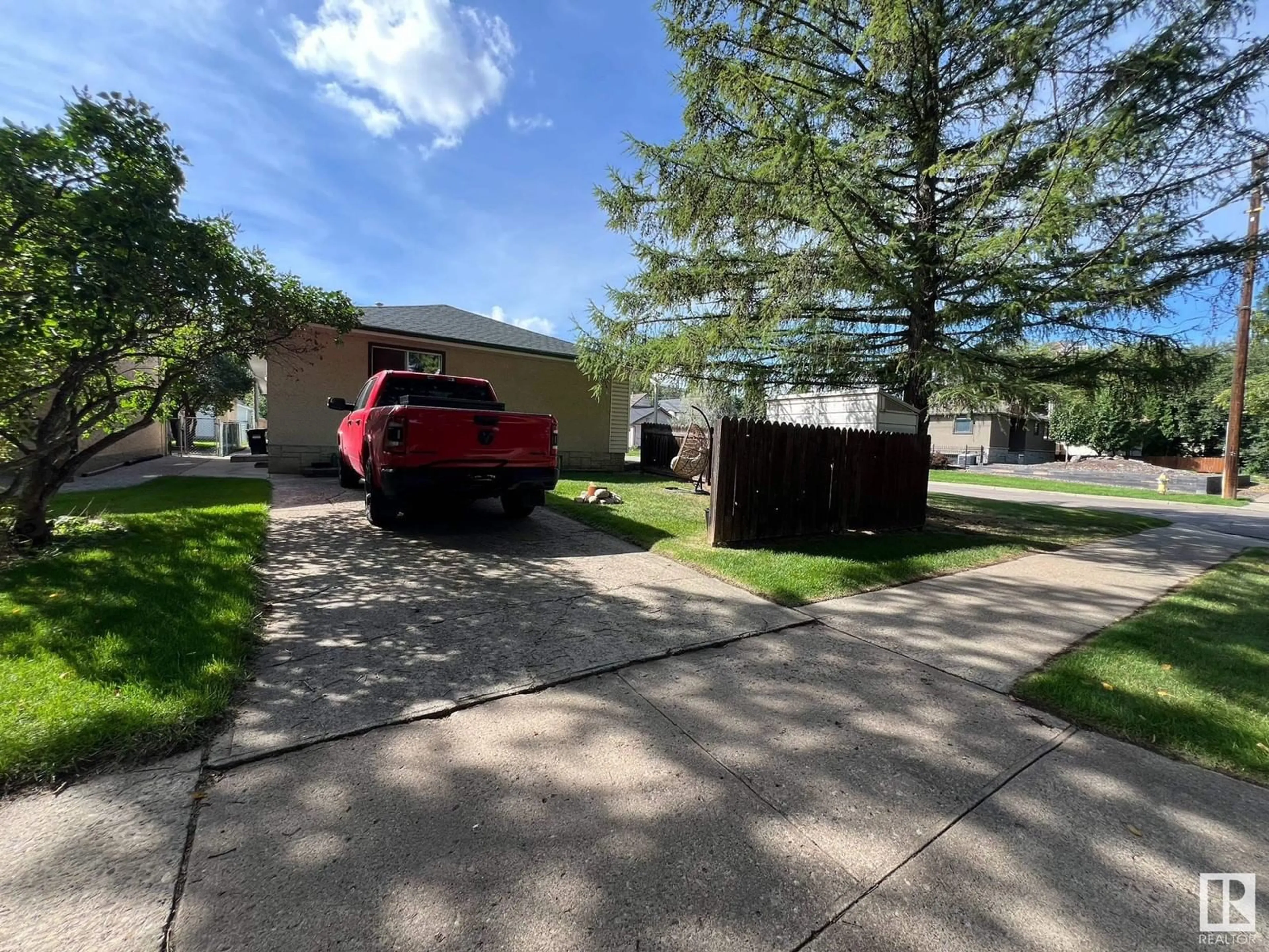 A pic from exterior of the house or condo, the street view for 8803 102 AV NW, Edmonton Alberta T5H0E1