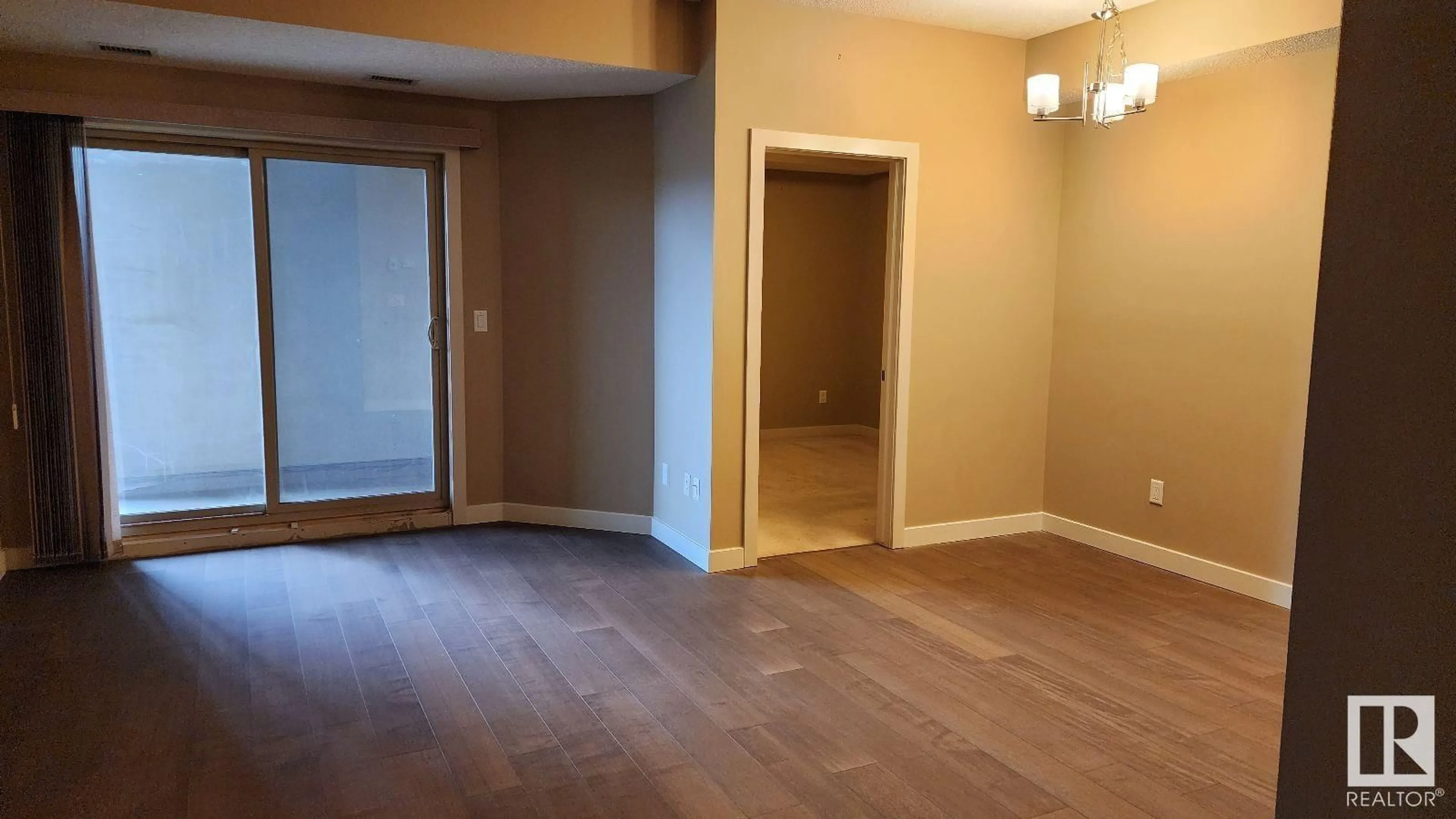 A pic of a room, wood floors for #316 10530 56 AV NW, Edmonton Alberta T6H0X7