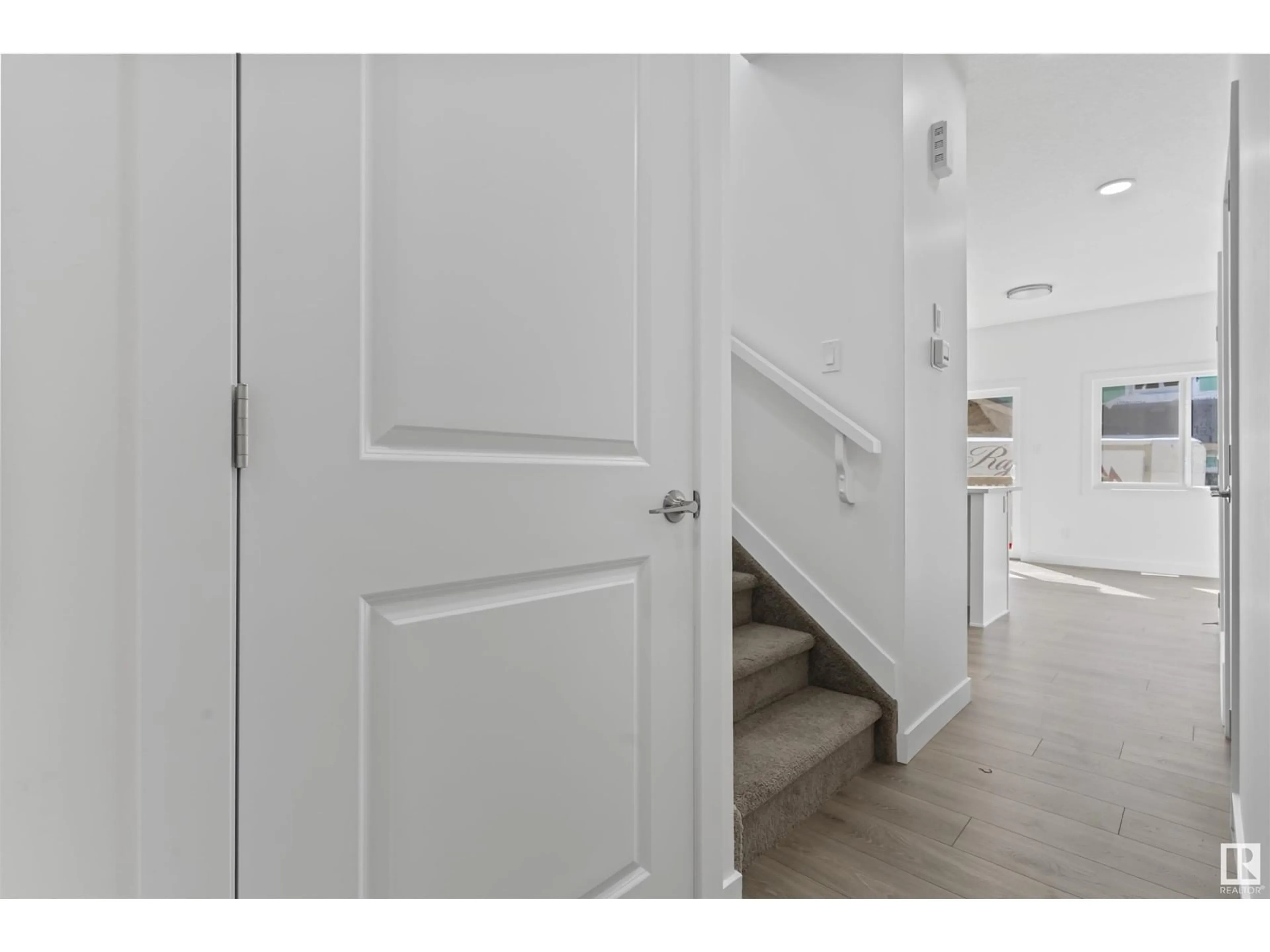 Indoor entryway, wood floors for #30 740 Daniels Way SW, Edmonton Alberta T6W5N1