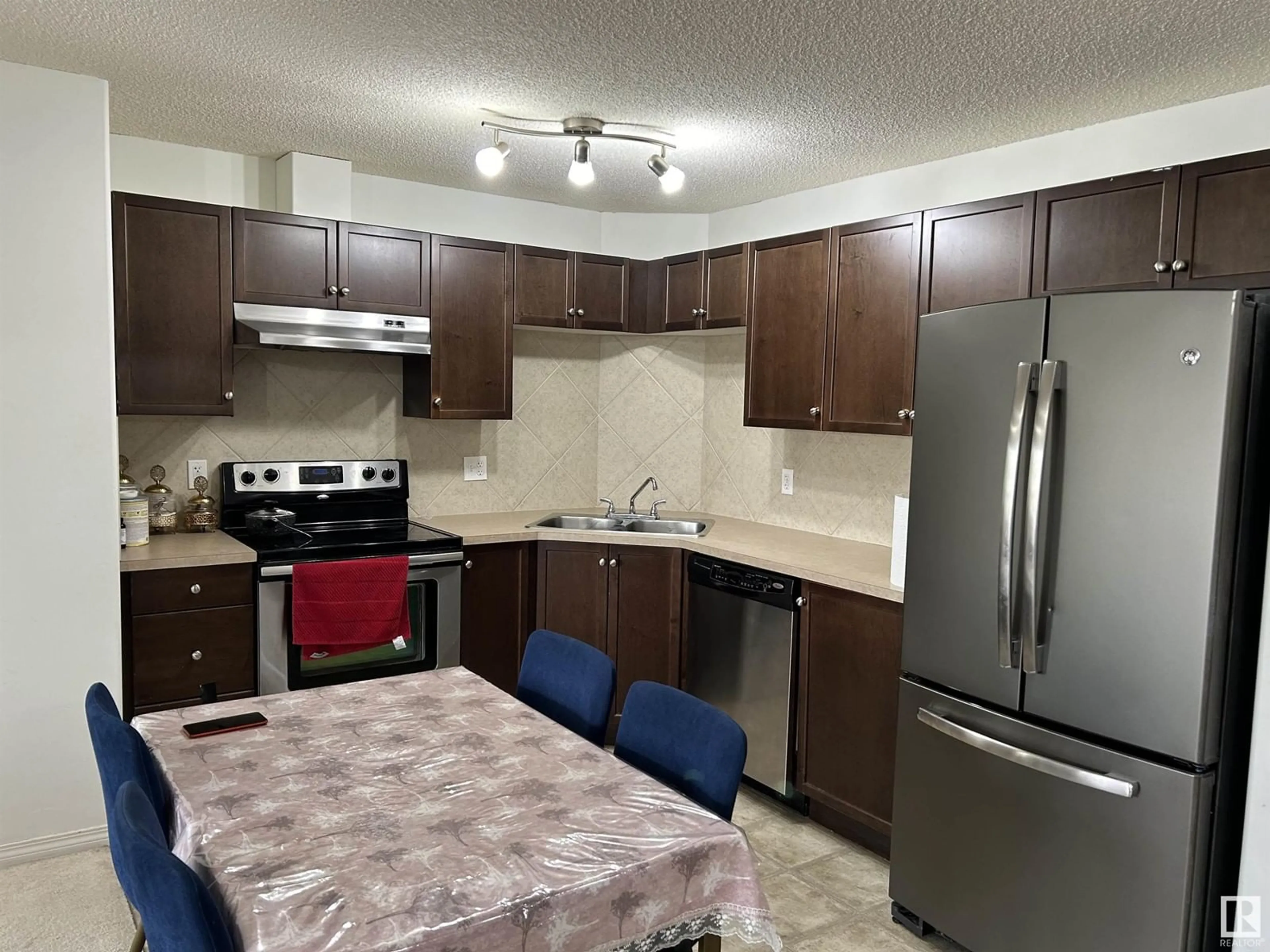 Standard kitchen, wood floors for #305 7327 SOUTH TERWILLEGAR DR NW, Edmonton Alberta T6R0L8