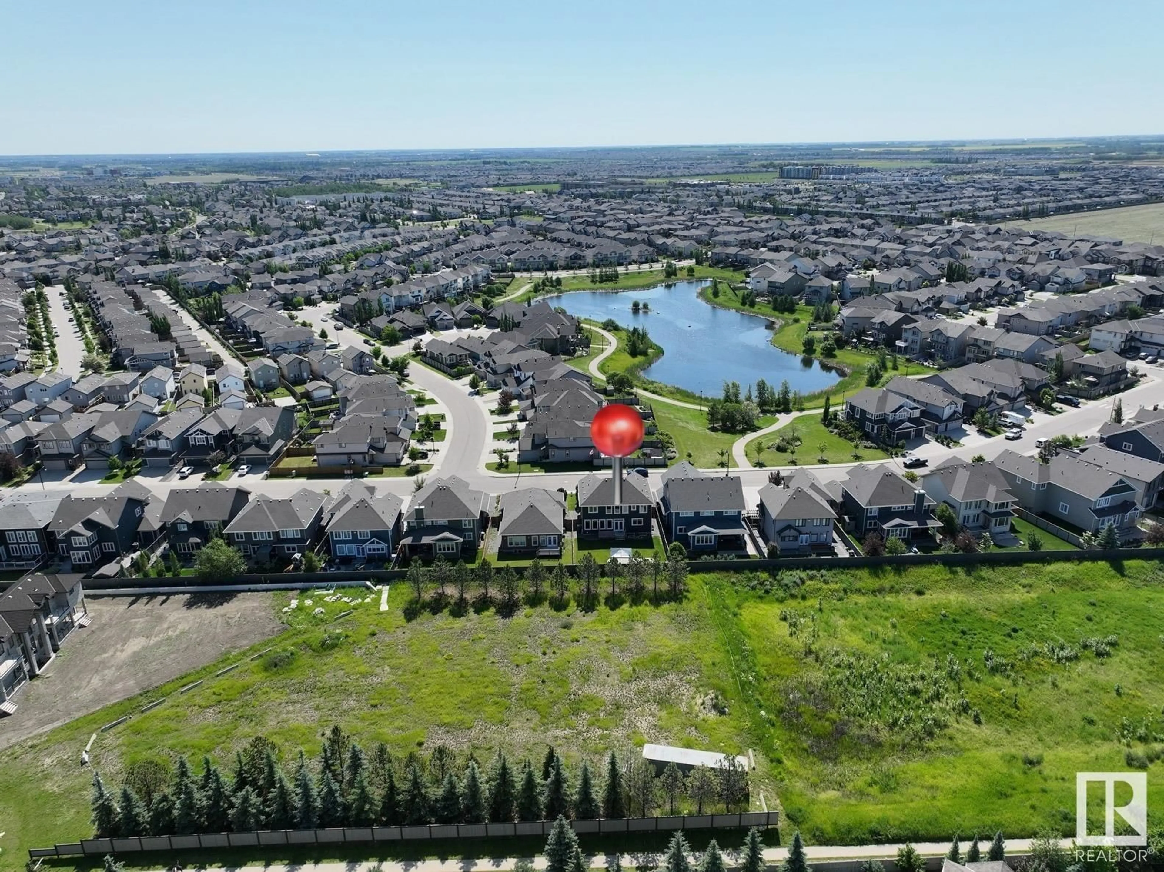 A pic from exterior of the house or condo, the street view for 648 180 ST SW, Edmonton Alberta T6W2T1