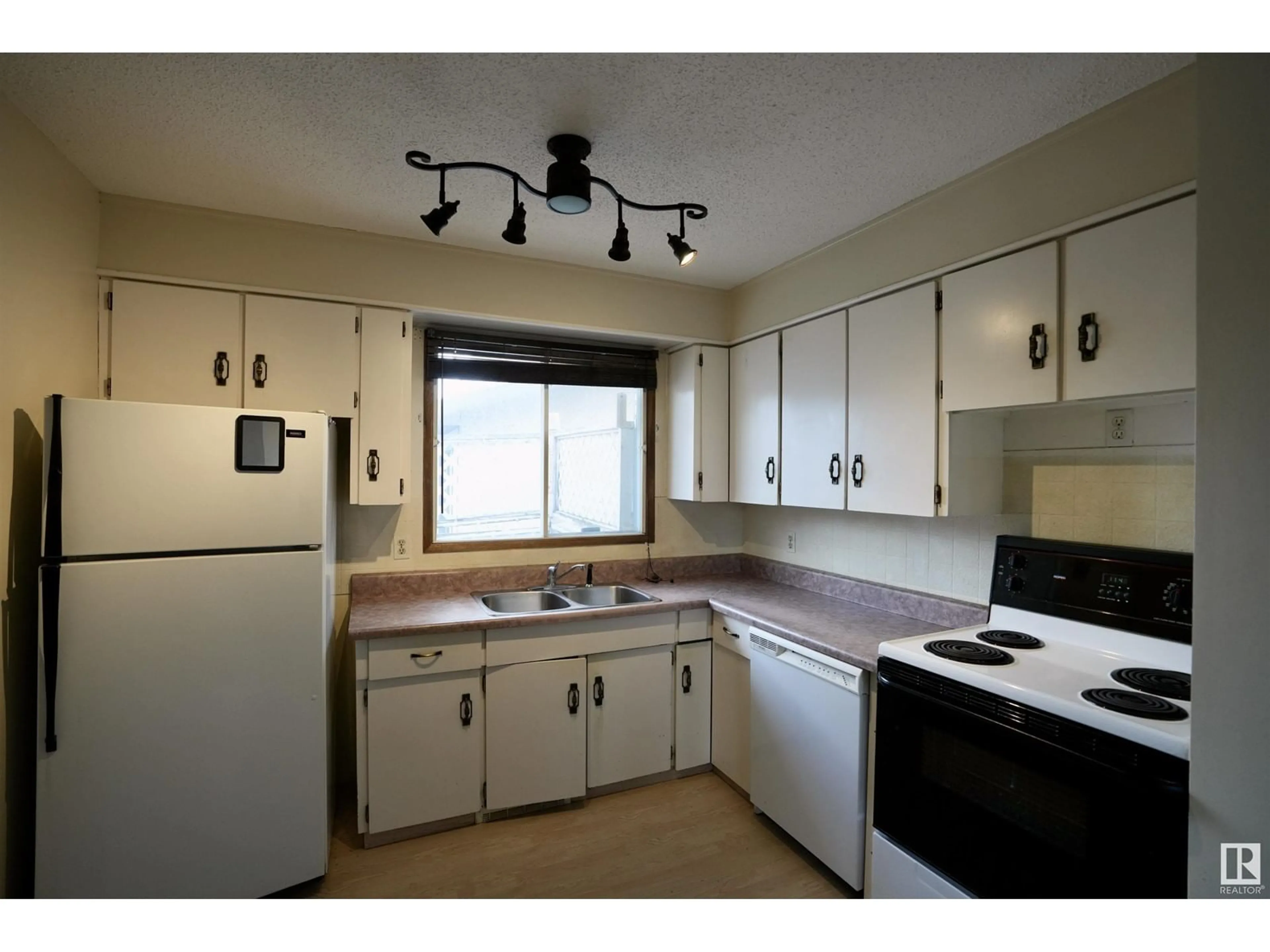 Standard kitchen, wood floors, cottage for 4801 42 ST, St. Paul Town Alberta T0A3A2