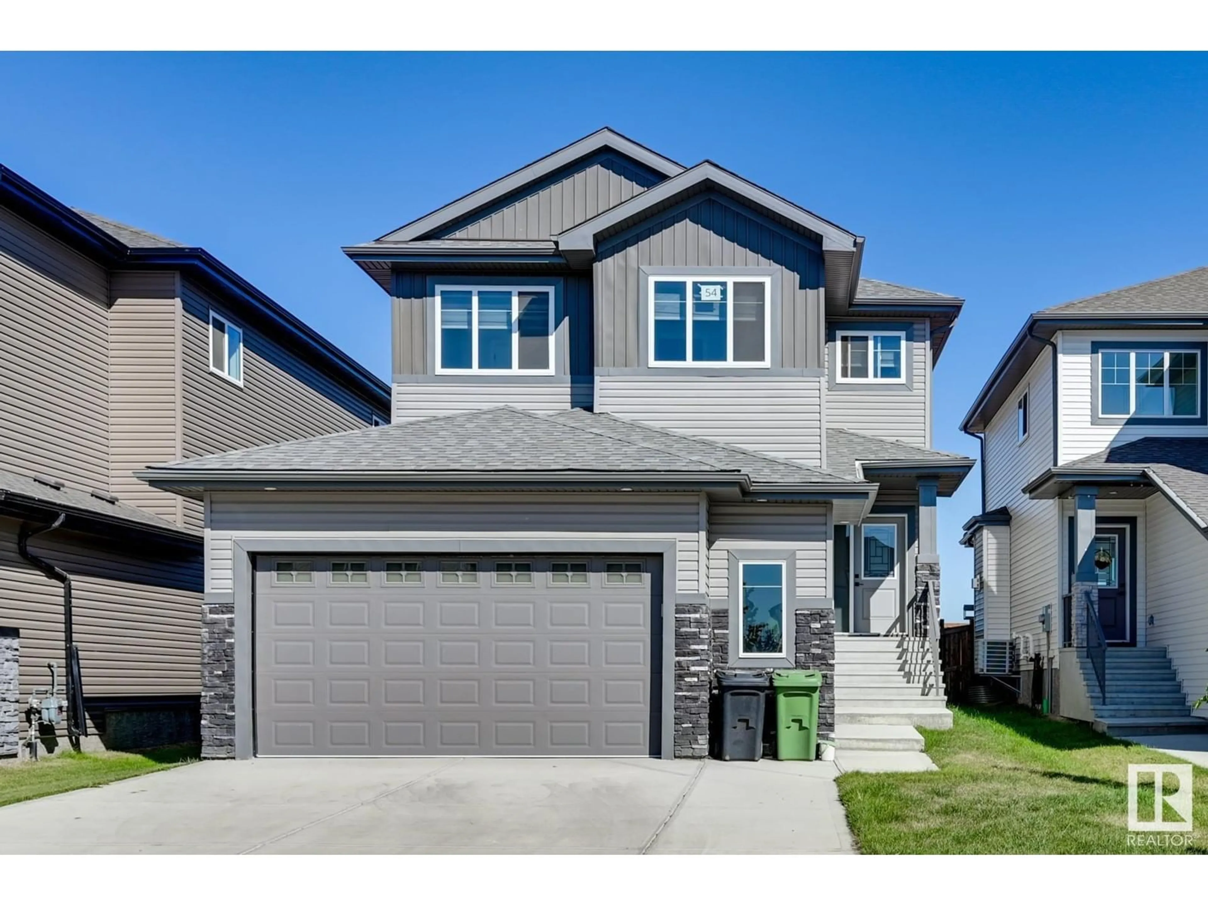 Frontside or backside of a home for 54 STARLING WY, Fort Saskatchewan Alberta T8L0Y1