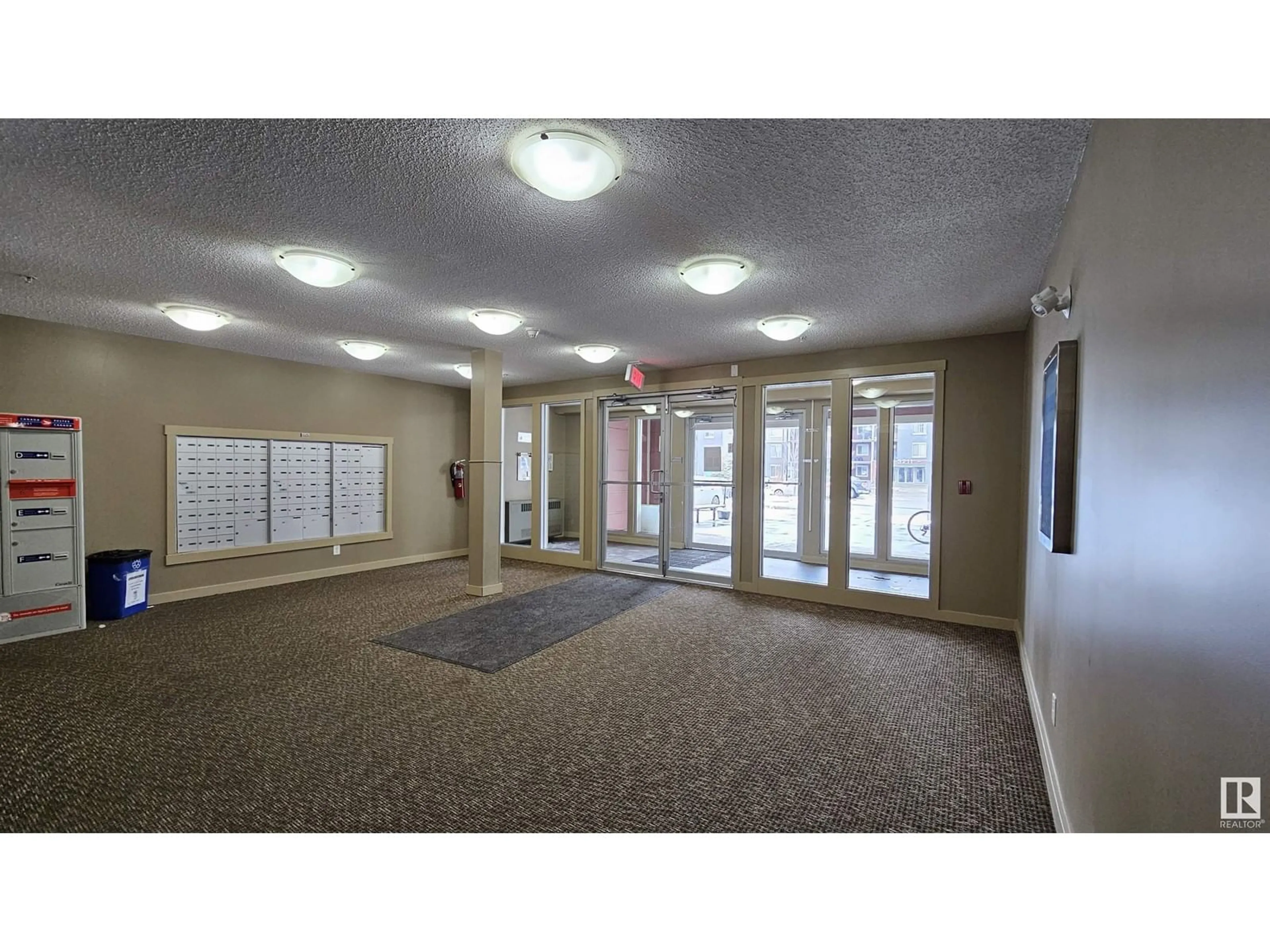 Indoor foyer, carpet floors for #415 3207 JAMES MOWATT TR SW, Edmonton Alberta T6W3L6