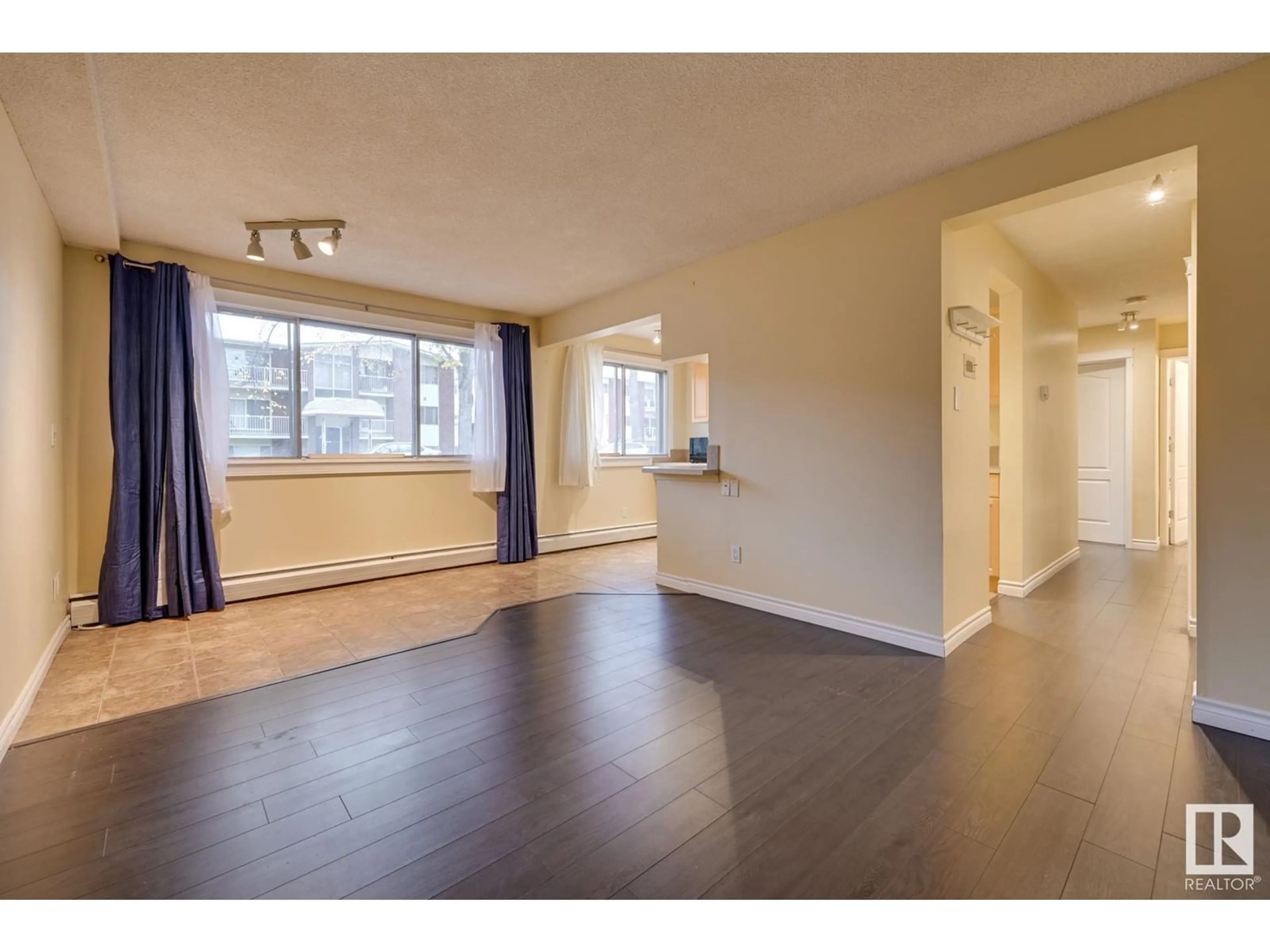 A pic of a room, wood floors for #105 10621 79 AV NW, Edmonton Alberta T6E1S2