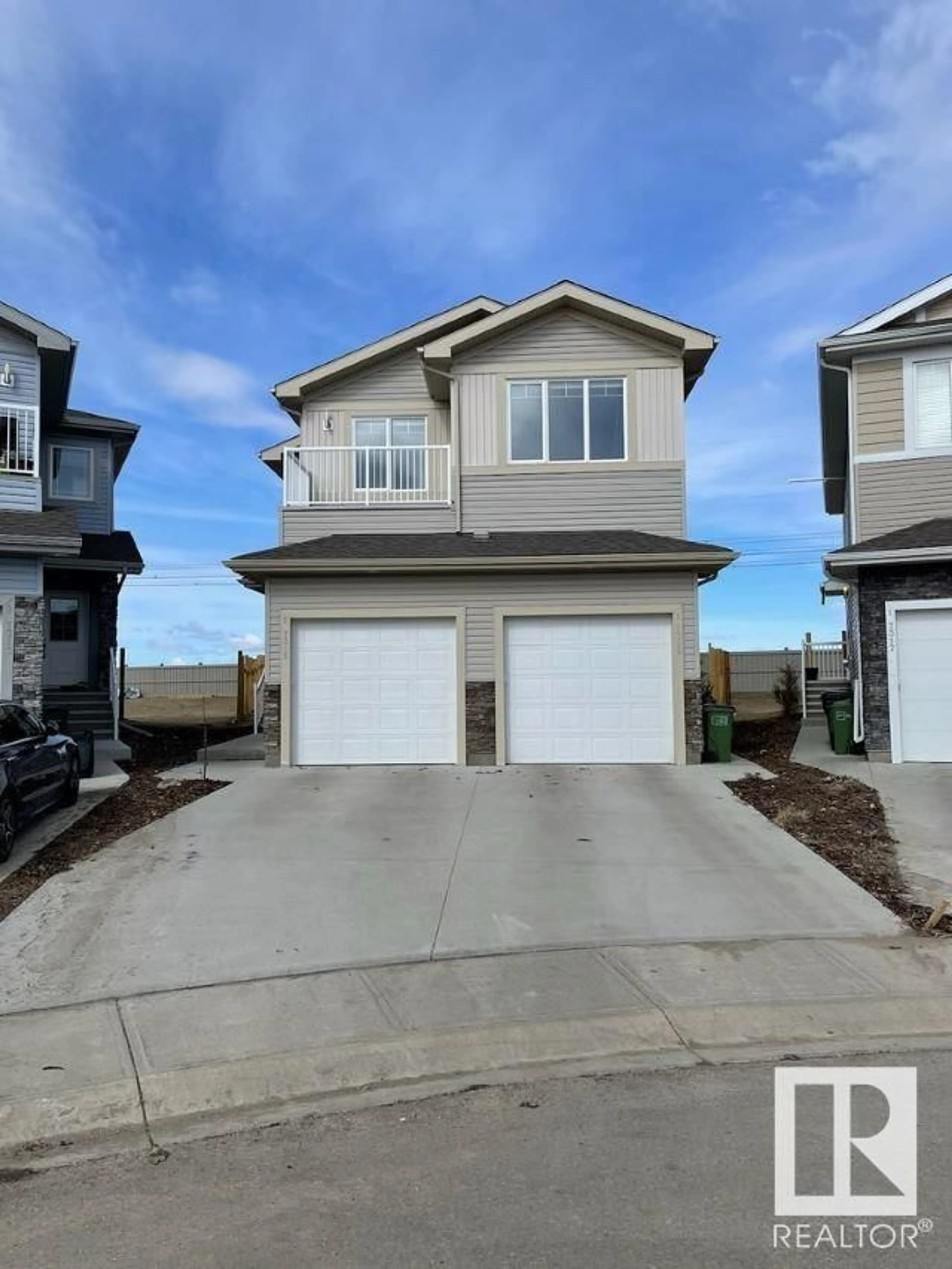 Frontside or backside of a home, the street view for 7315 CREIGHTON CL SW, Edmonton Alberta T6W3J6