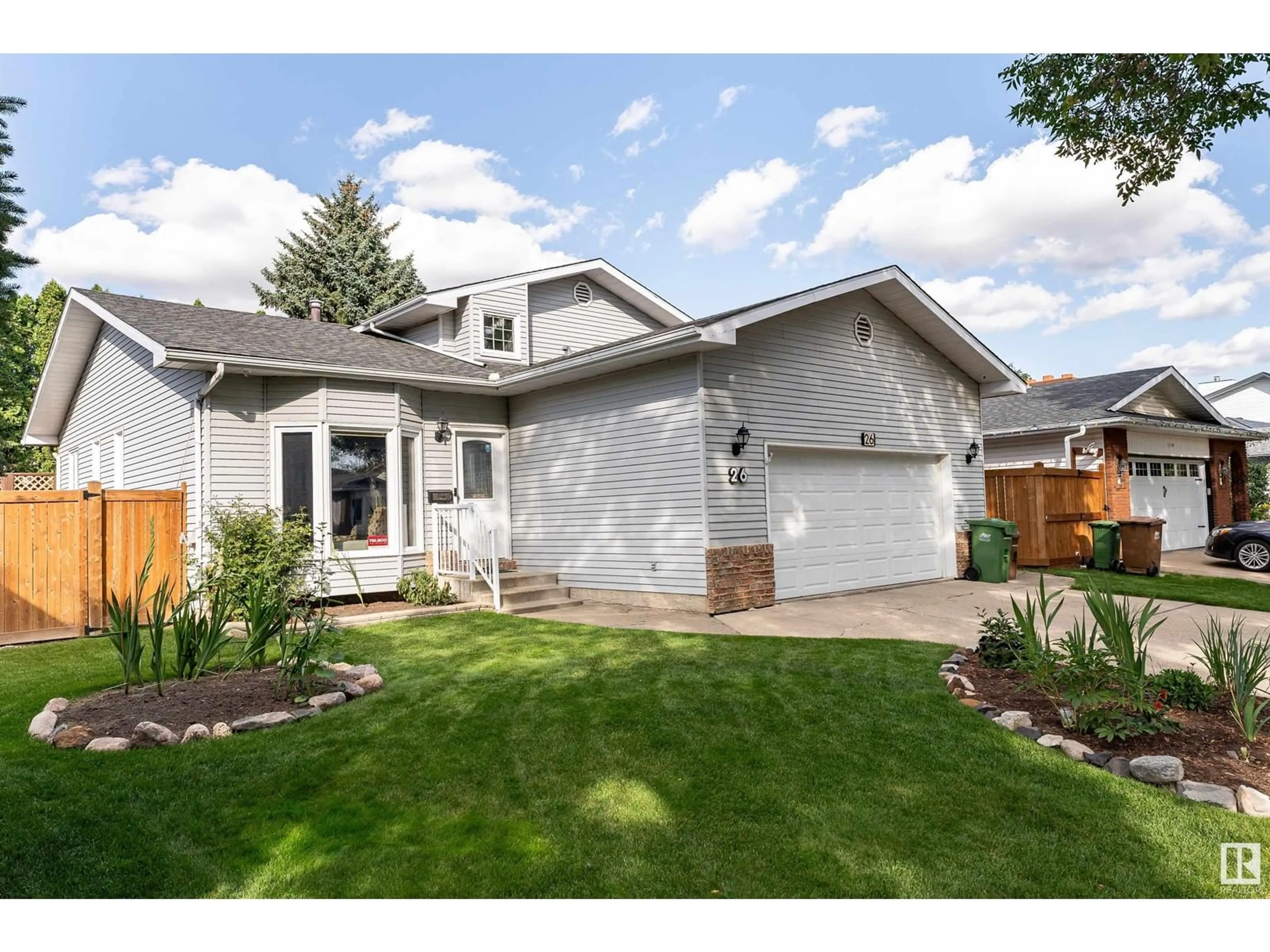 Frontside or backside of a home, the fenced backyard for 26 LENNOX DR, St. Albert Alberta T8N4L6