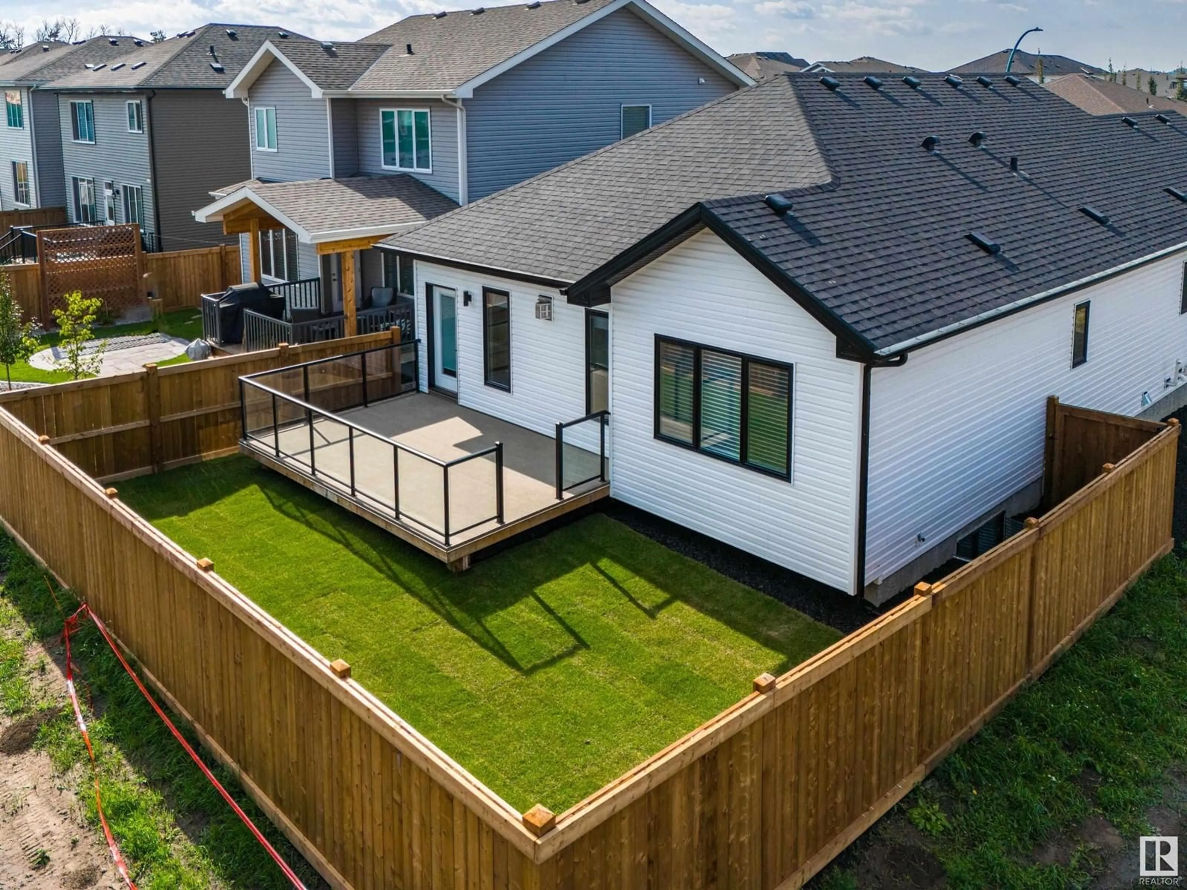 Frontside or backside of a home, the fenced backyard for 40 DILLWORTH CR, Spruce Grove Alberta T7X0E6