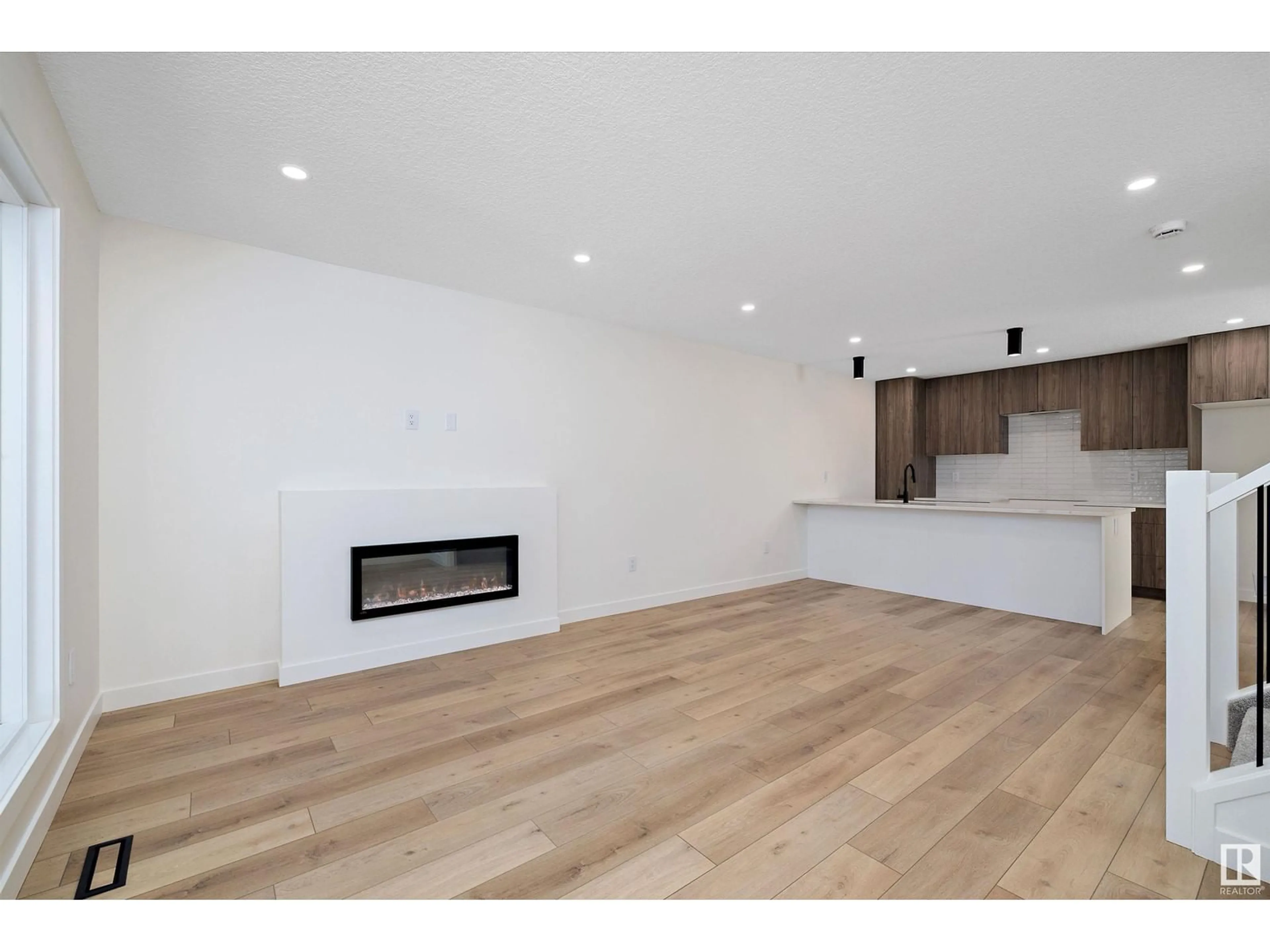 A pic of a room, wood floors for 11740 91 ST NW, Edmonton Alberta T5B4B3