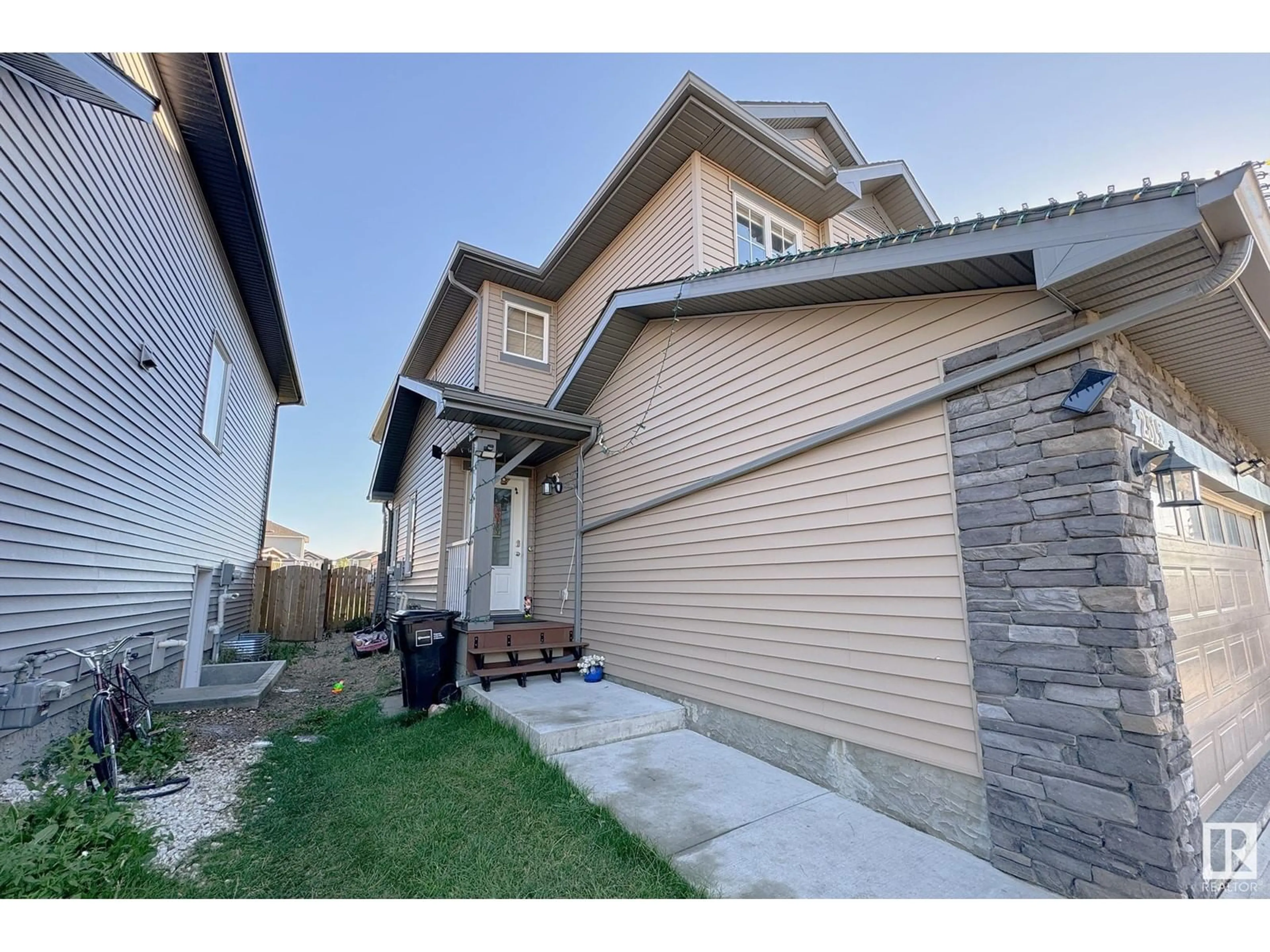 Frontside or backside of a home, the street view for 2315 22 AV NW, Edmonton Alberta T6T0Y4