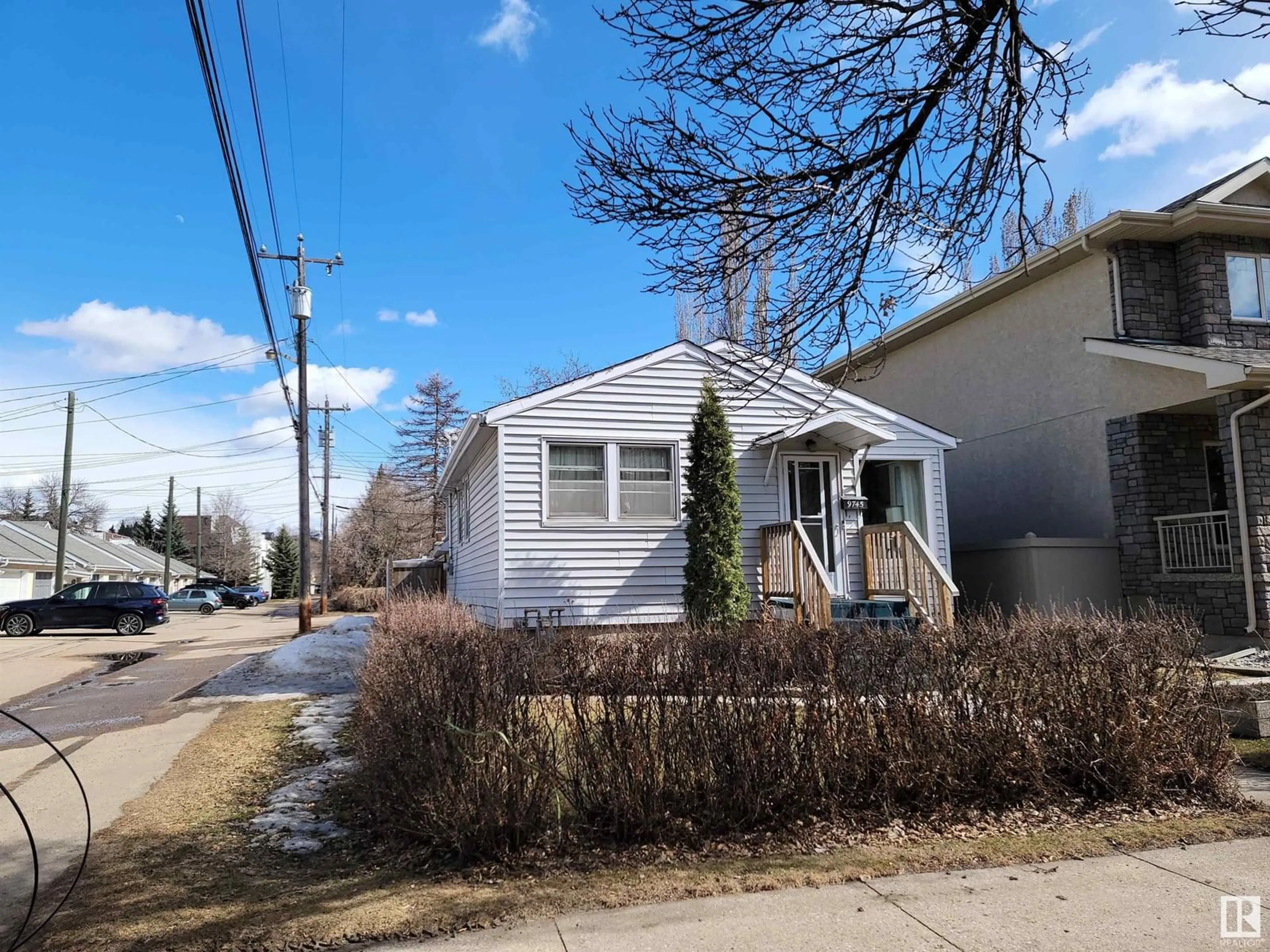 A pic from exterior of the house or condo, the street view for 9745 94 ST NW, Edmonton Alberta T6C3W1