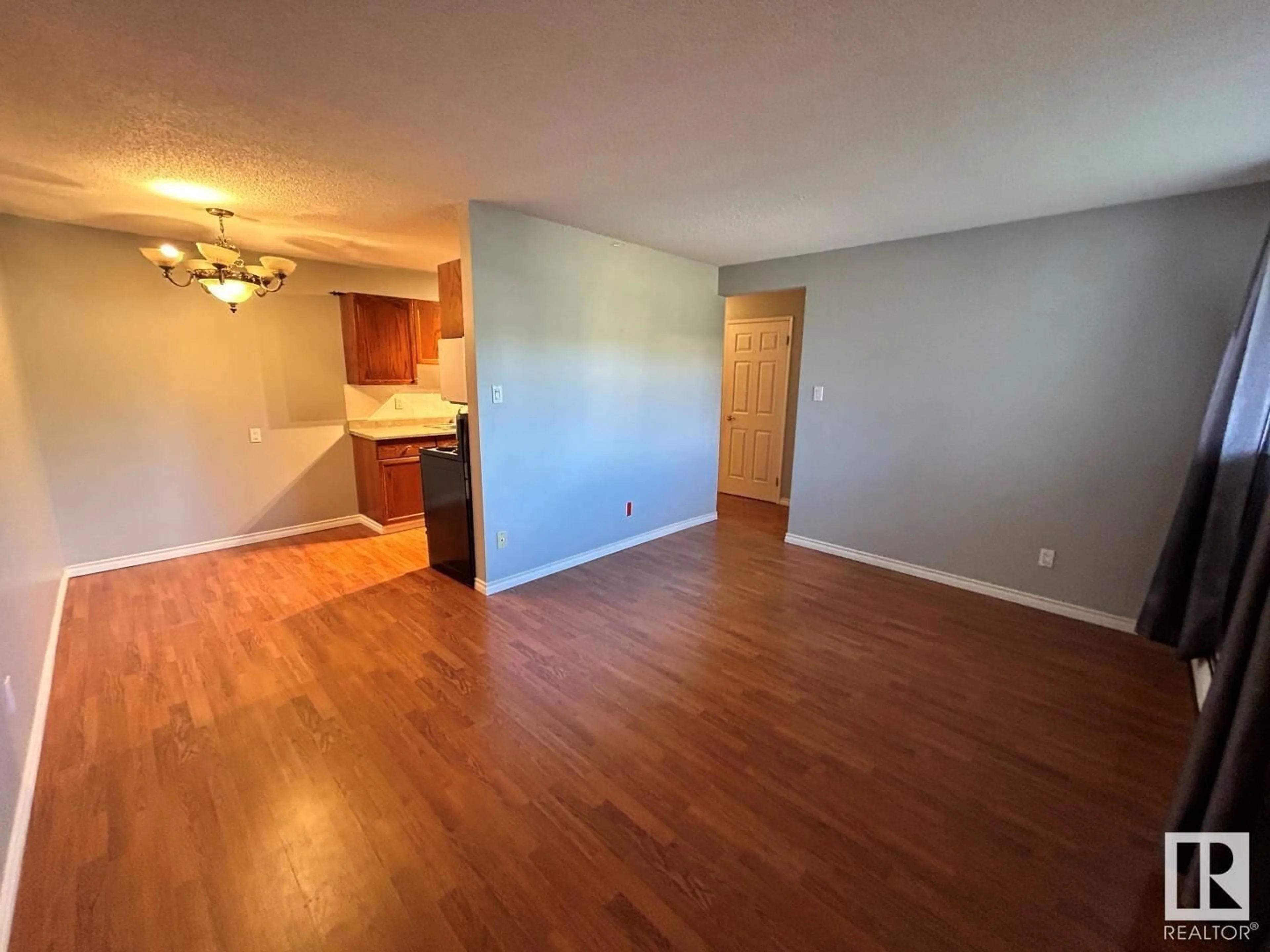 A pic of a room, wood floors for #104 10230 114 ST NW, Edmonton Alberta T5K1R9