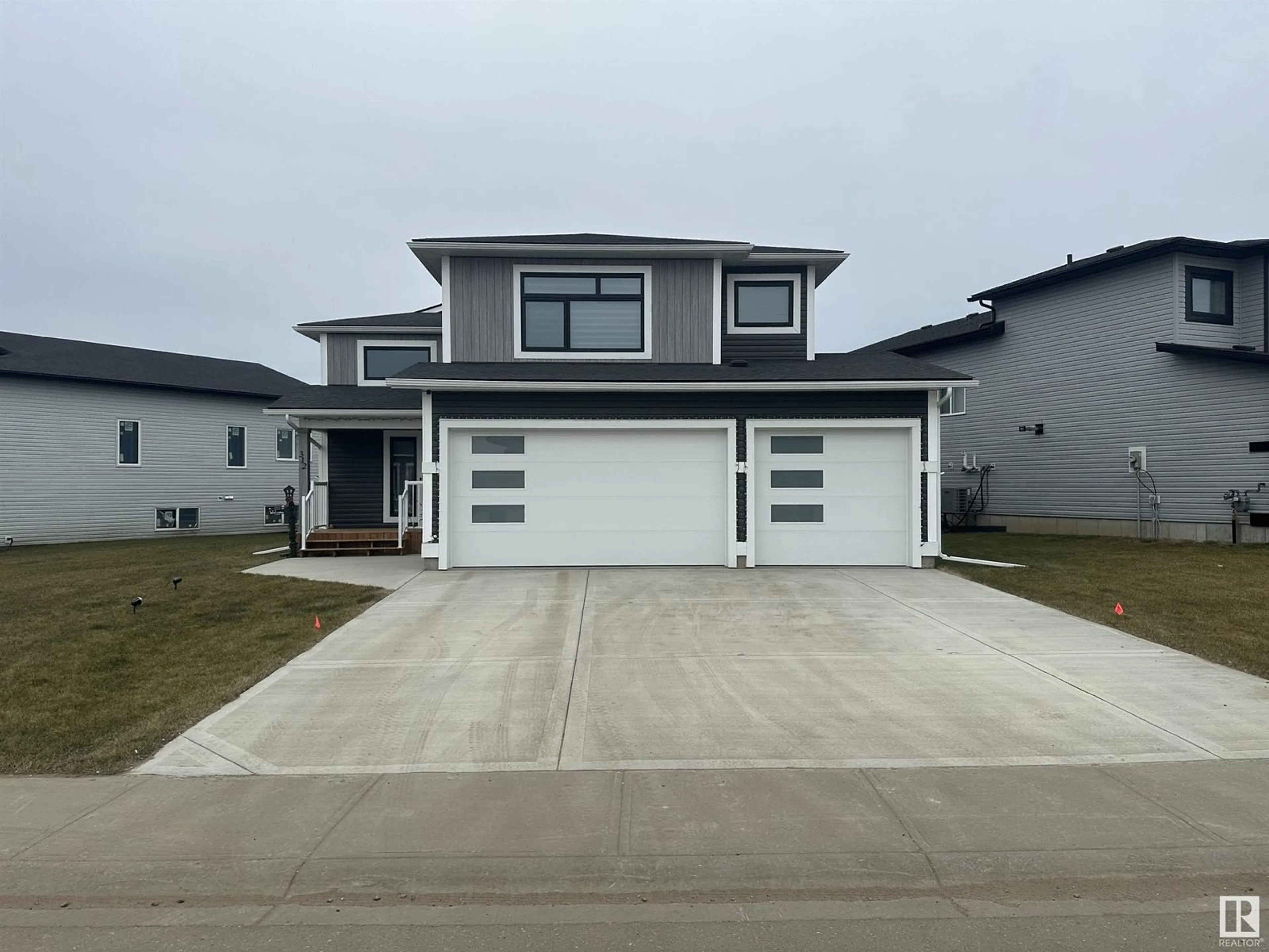 Frontside or backside of a home, the street view for 318 Fundy WY, Cold Lake Alberta T9M0M4