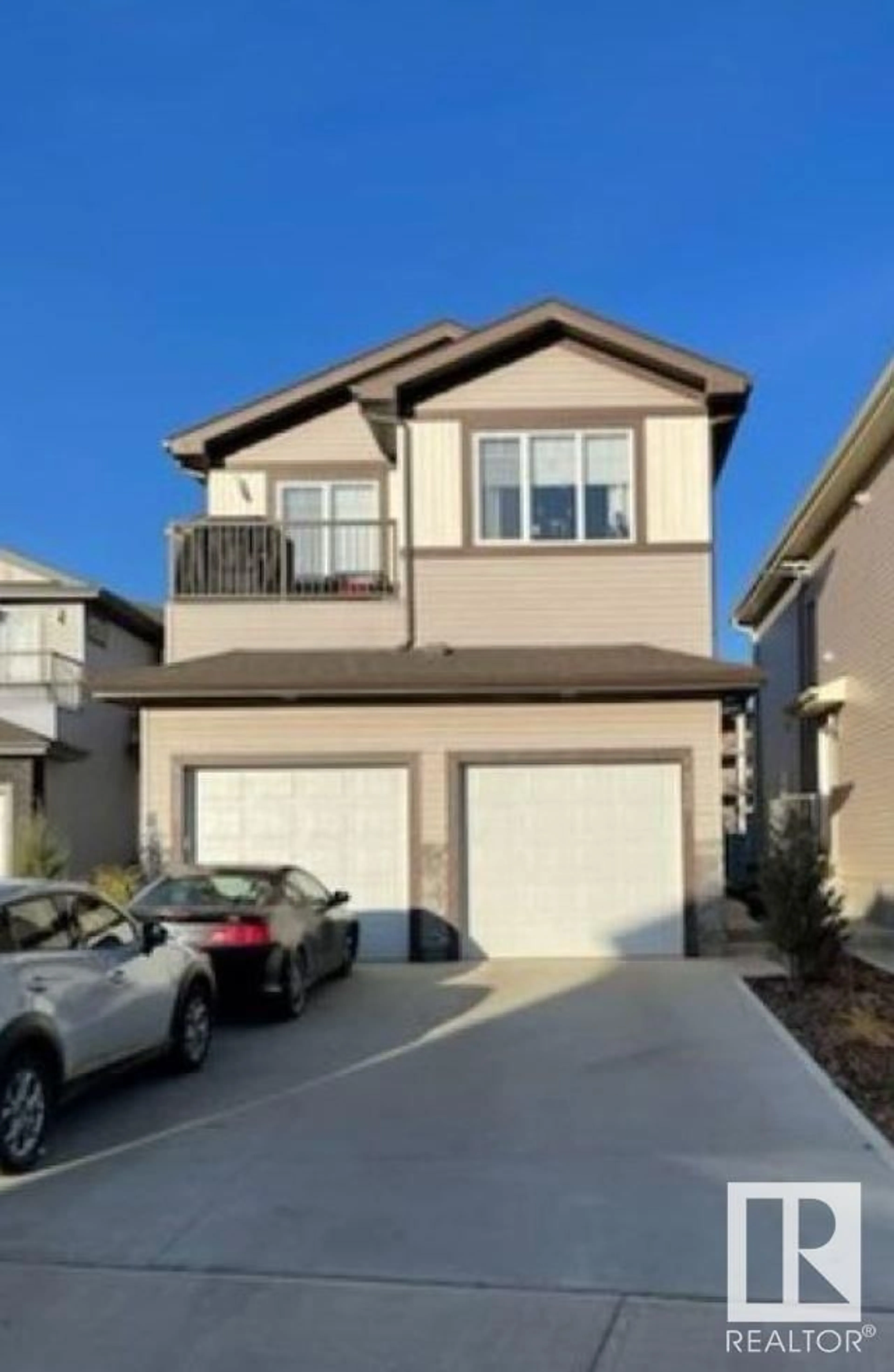 Frontside or backside of a home, the street view for 7306 CREIGHTON CL SW, Edmonton Alberta T6W3J6