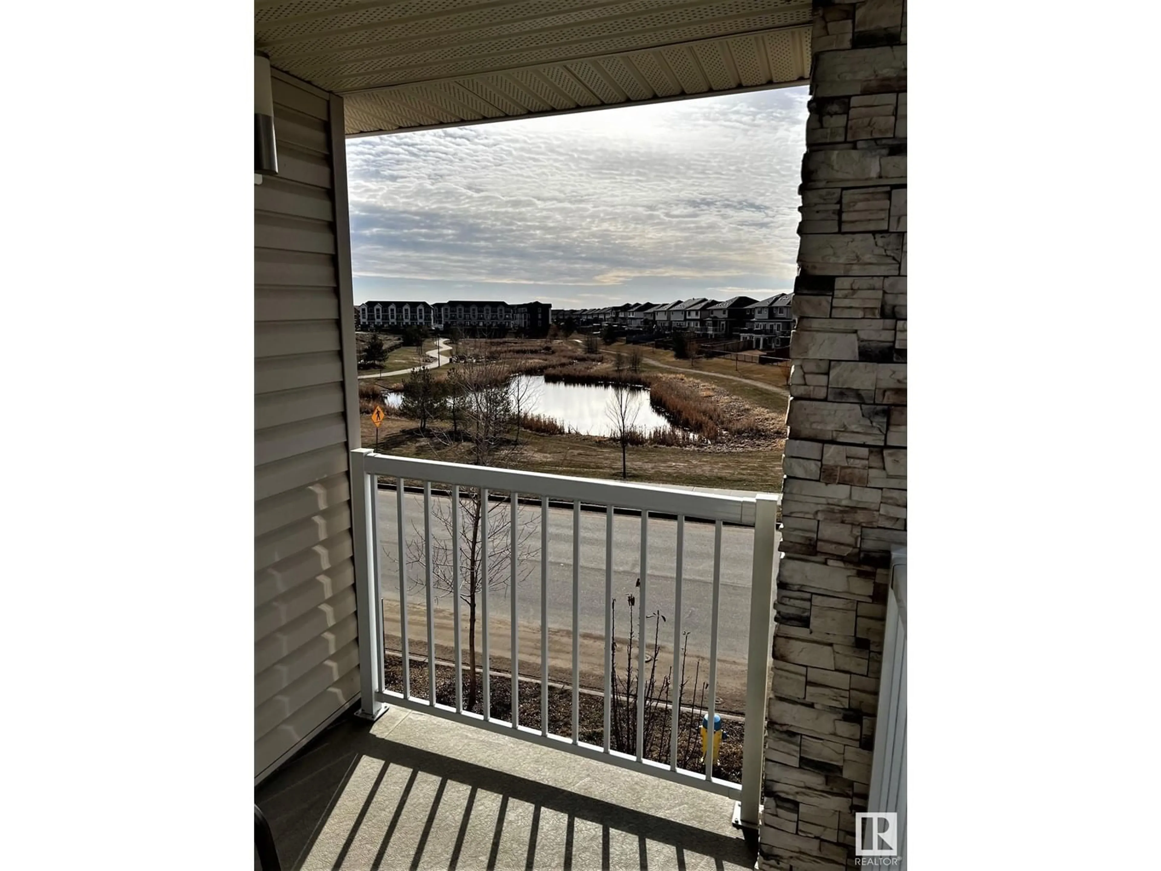 Balcony in the apartment, the view of lake or river for 7306 CREIGHTON CL SW, Edmonton Alberta T6W3J6