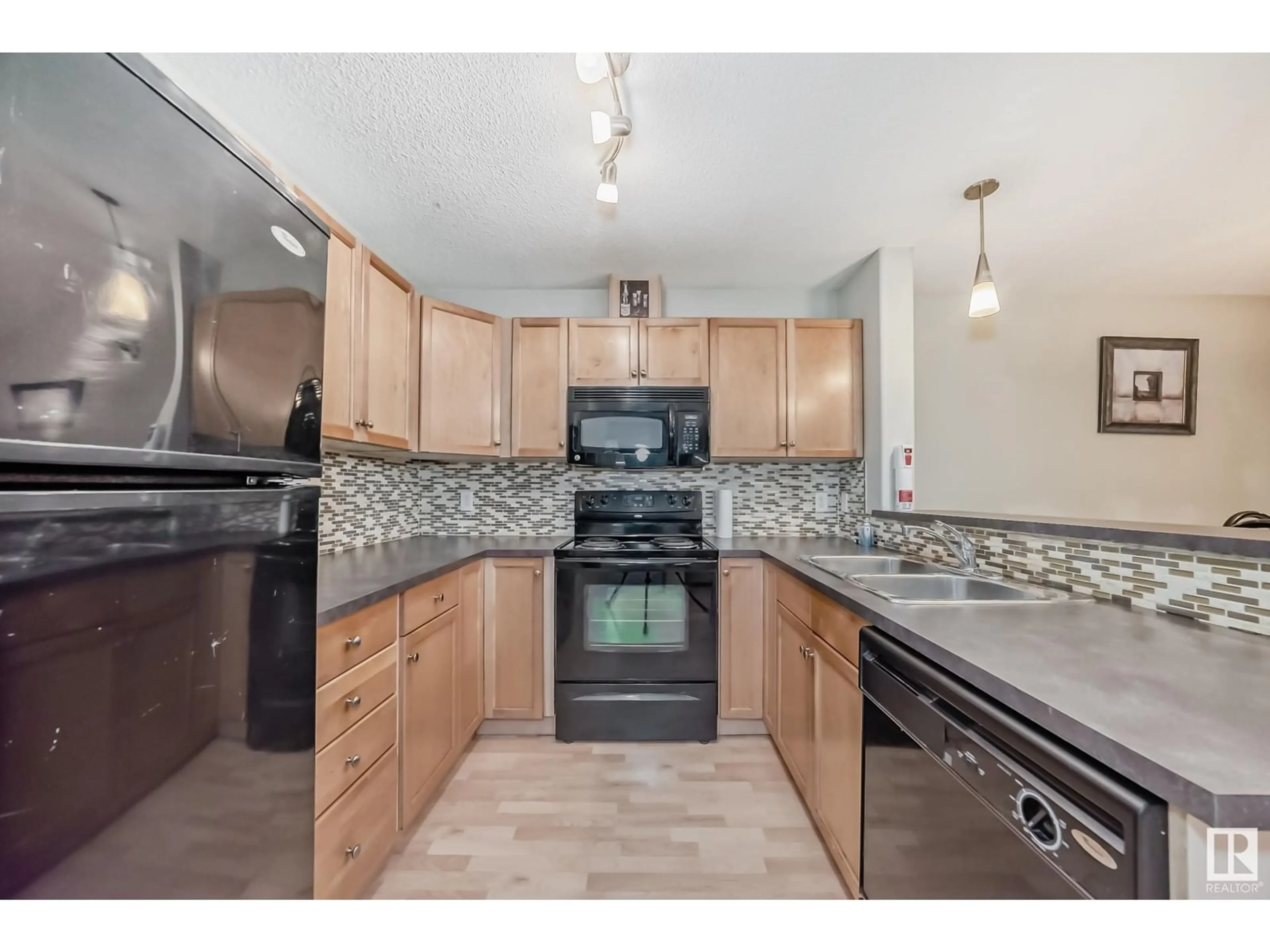 Standard kitchen, wood floors, cottage for #124 646 MCALLISTER LO SW, Edmonton Alberta T6W0B5