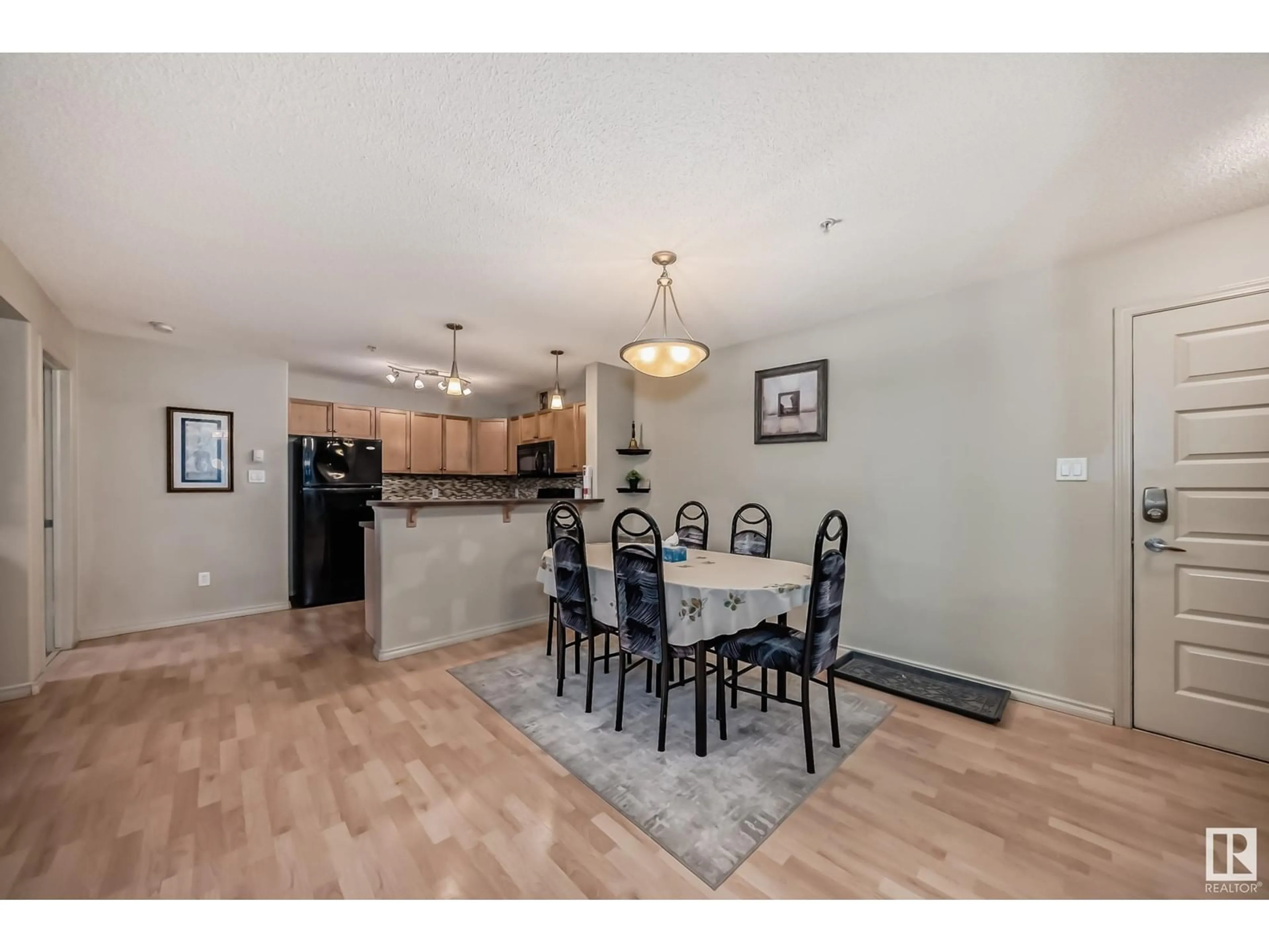 Dining room, wood floors for #124 646 MCALLISTER LO SW, Edmonton Alberta T6W0B5