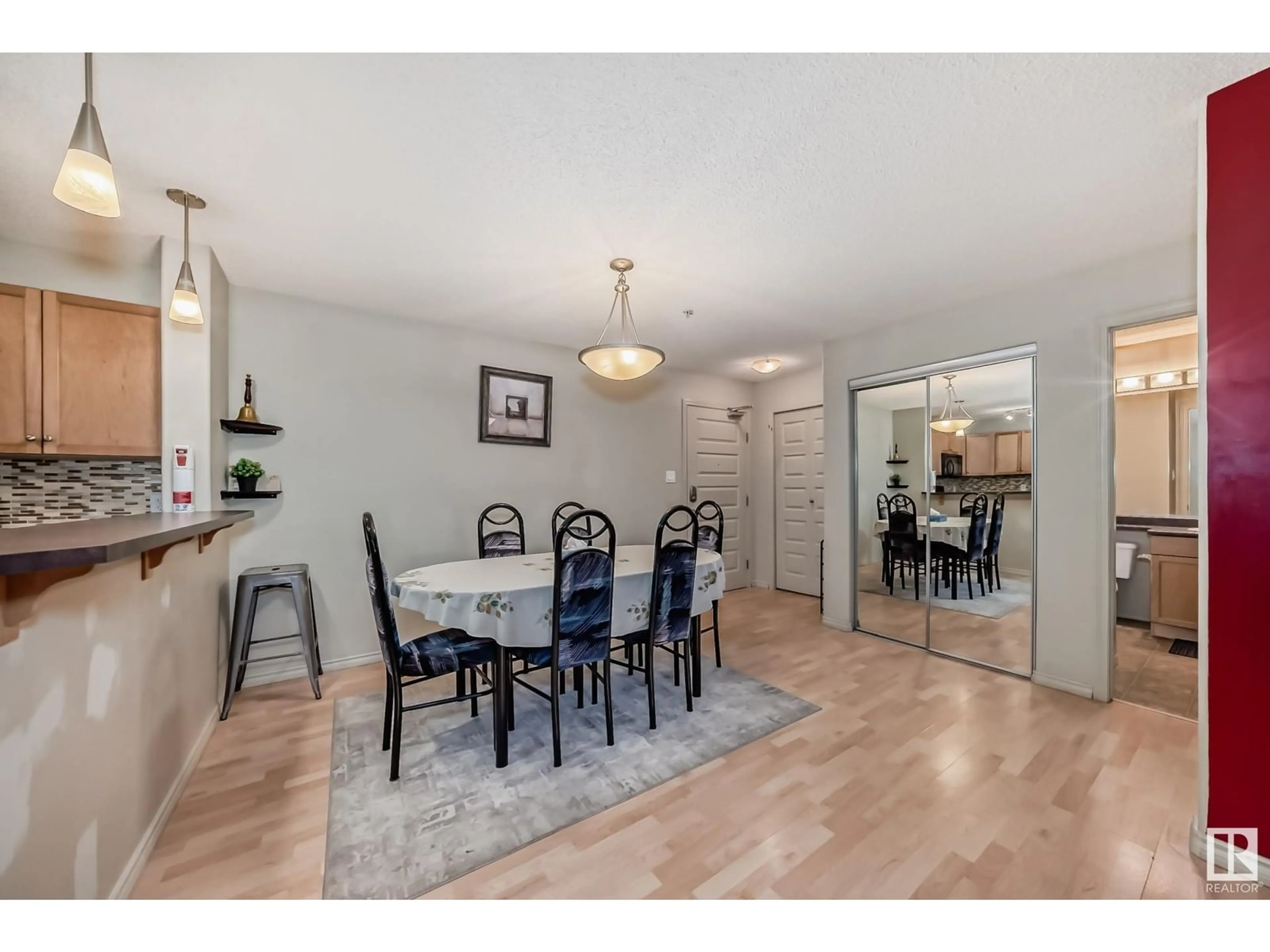 Dining room, wood floors for #124 646 MCALLISTER LO SW, Edmonton Alberta T6W0B5