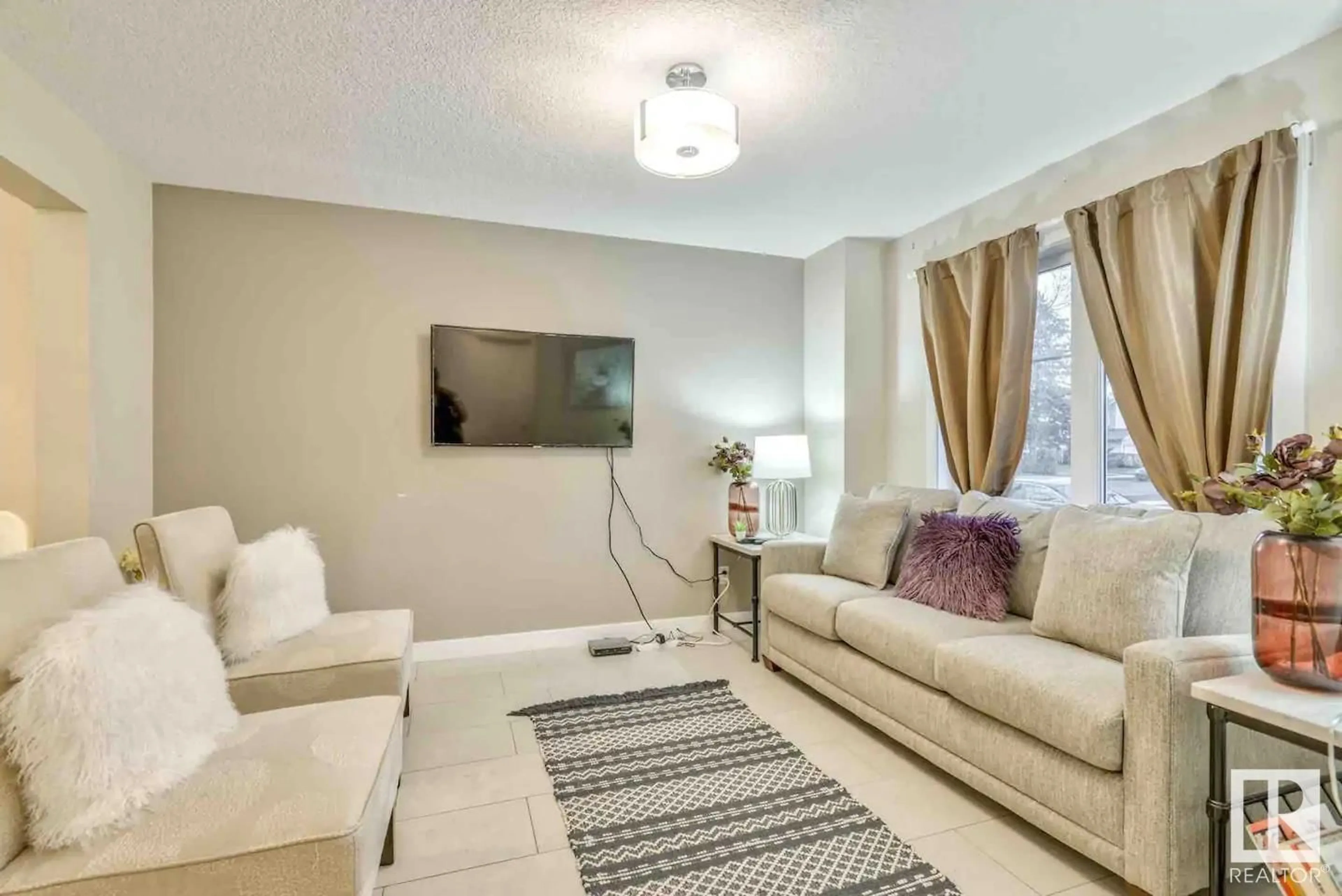 Living room, carpet floors for 12219 117 AV NW NW, Edmonton Alberta T5M0G7