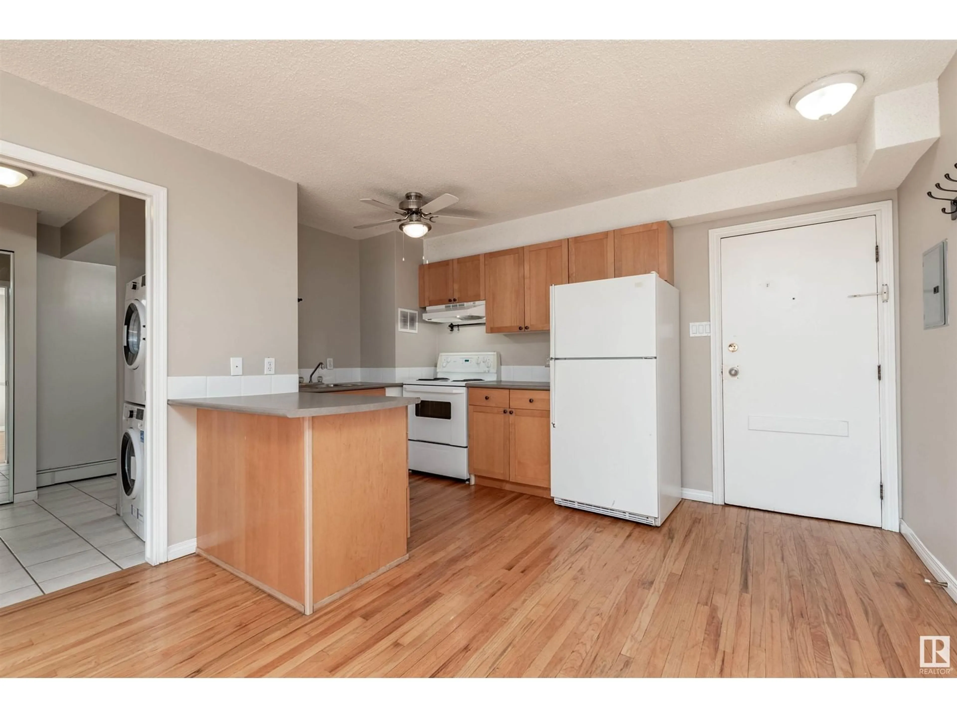 Standard kitchen, wood floors for #907 9730 106 ST NW, Edmonton Alberta T5K1B7