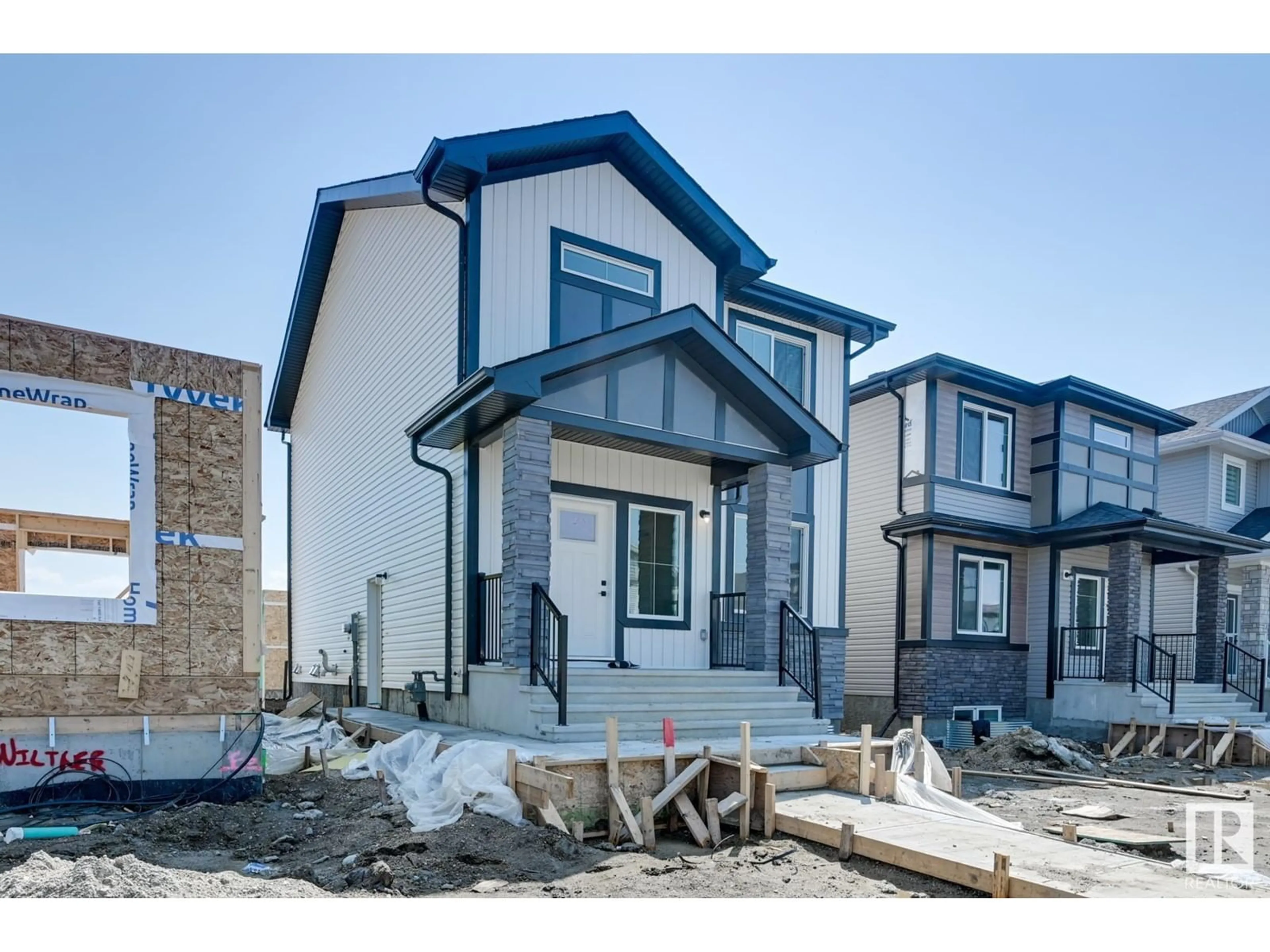 Home with vinyl exterior material, street for 54 EDEN LI, Fort Saskatchewan Alberta T8L0Z2