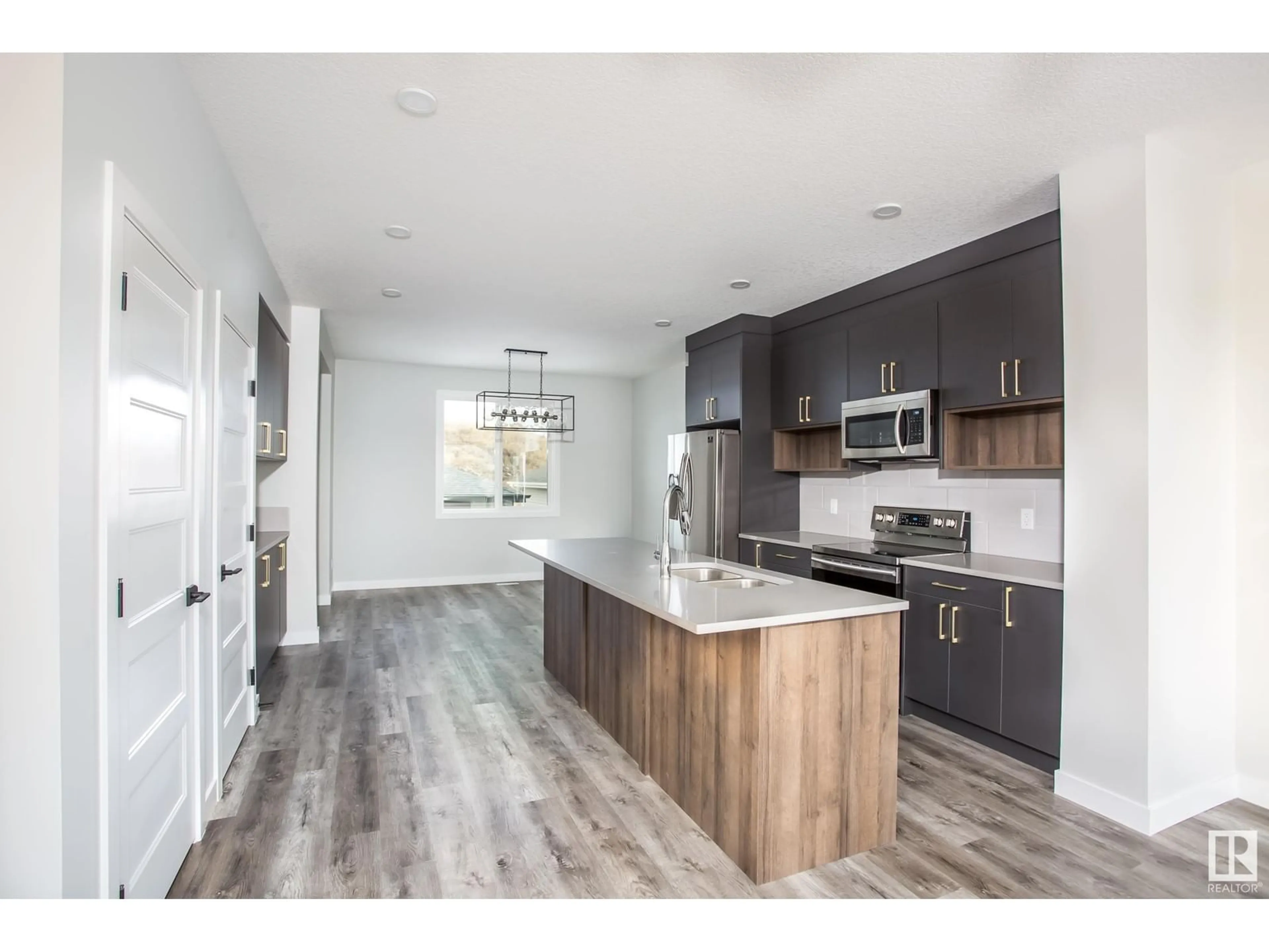 Open concept kitchen, unknown for 54 EDEN LI, Fort Saskatchewan Alberta T8L0Z2