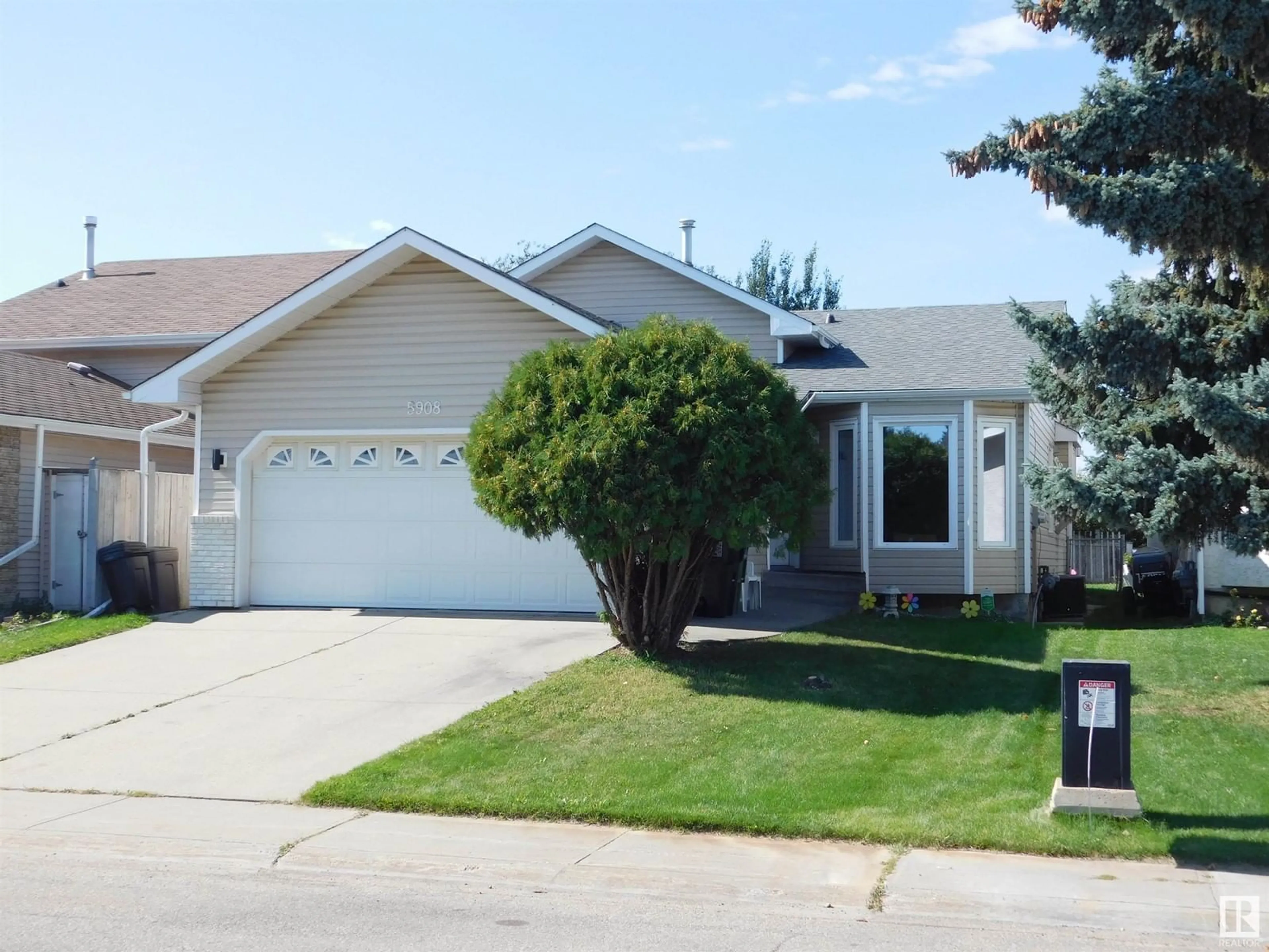 Frontside or backside of a home, the street view for 5908 189 ST NW, Edmonton Alberta T6M2G5