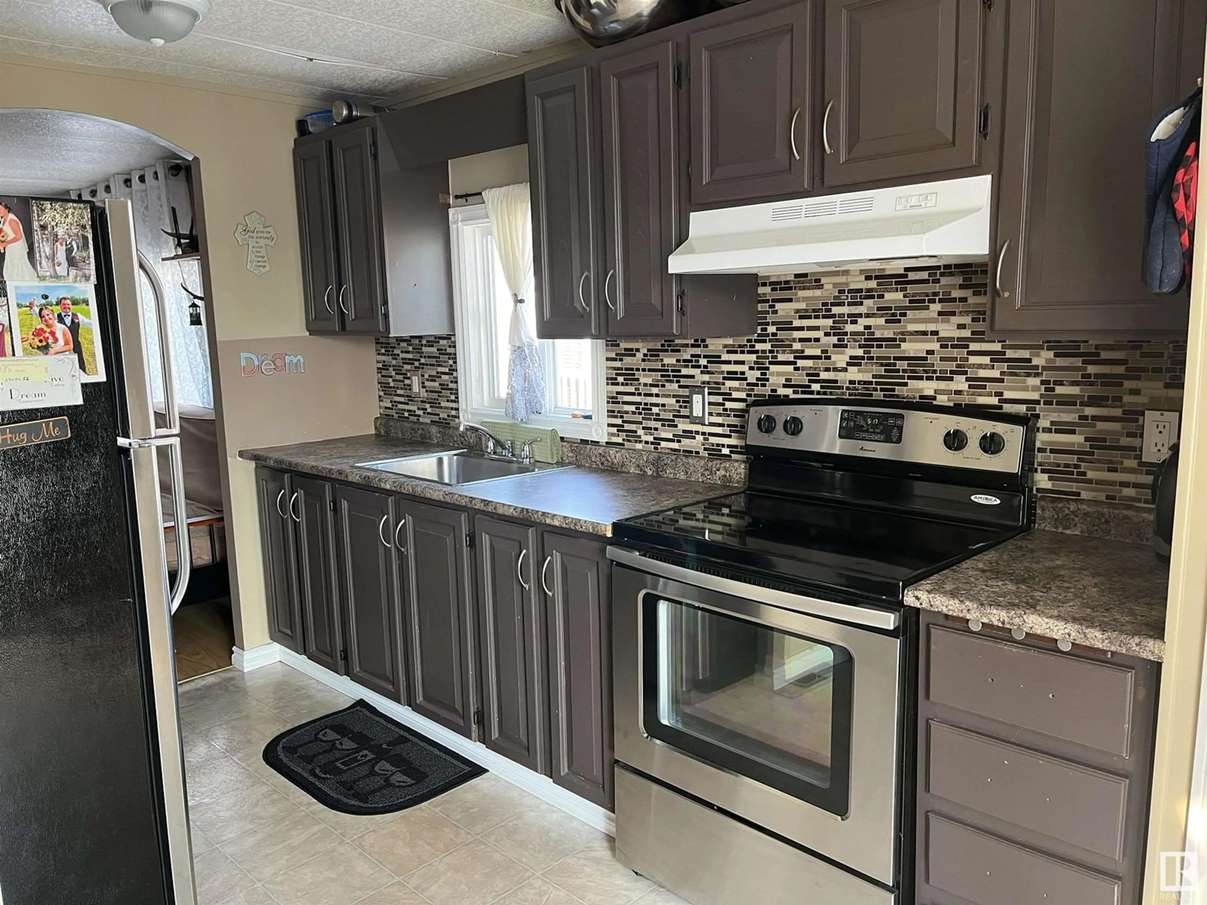 Standard kitchen, ceramic floors, cottage for 18 Sportsman Trailer Park, Bonnyville Town Alberta T9N2H6