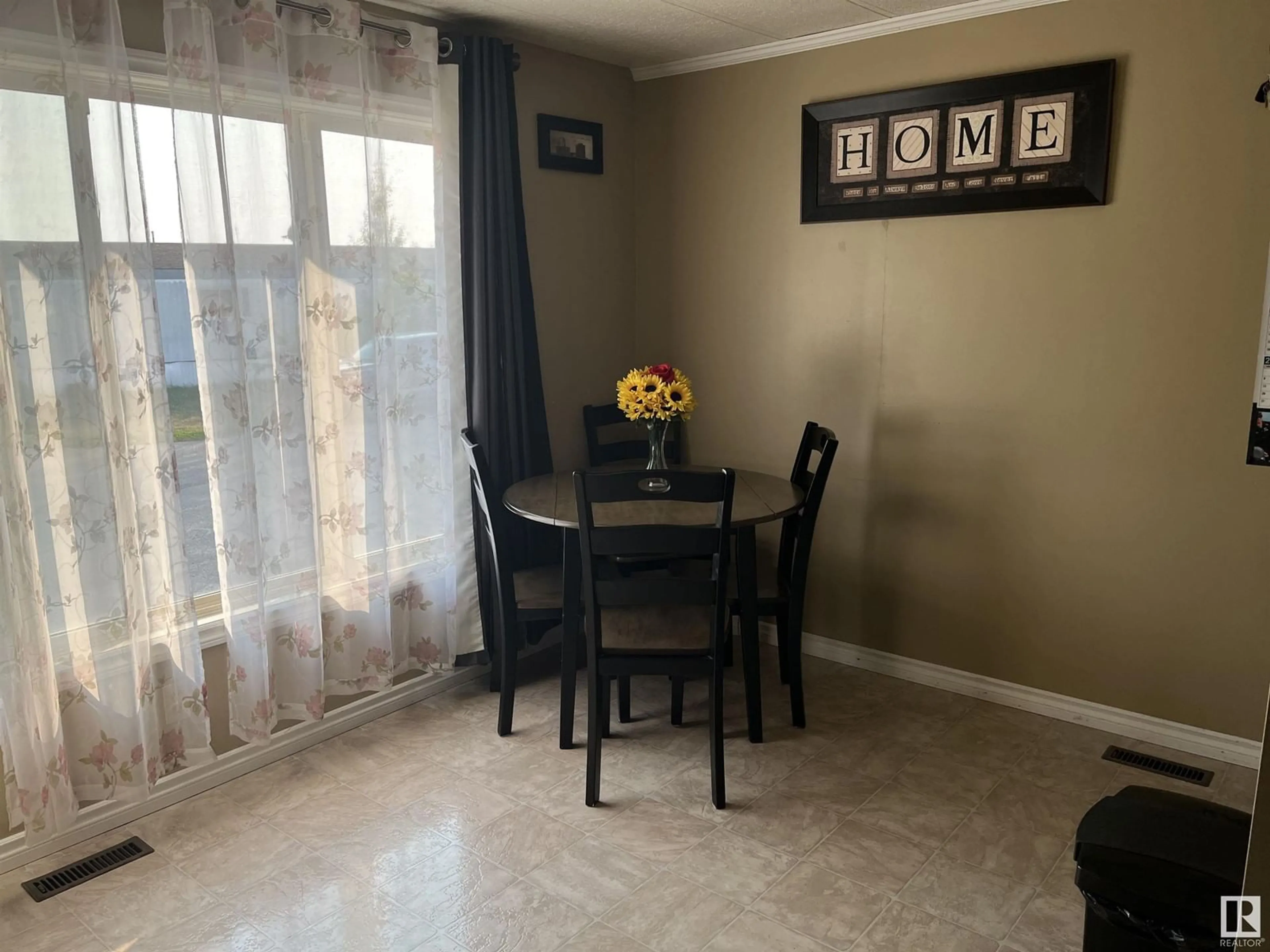 Dining room, ceramic floors, cottage for 18 Sportsman Trailer Park, Bonnyville Town Alberta T9N2H6