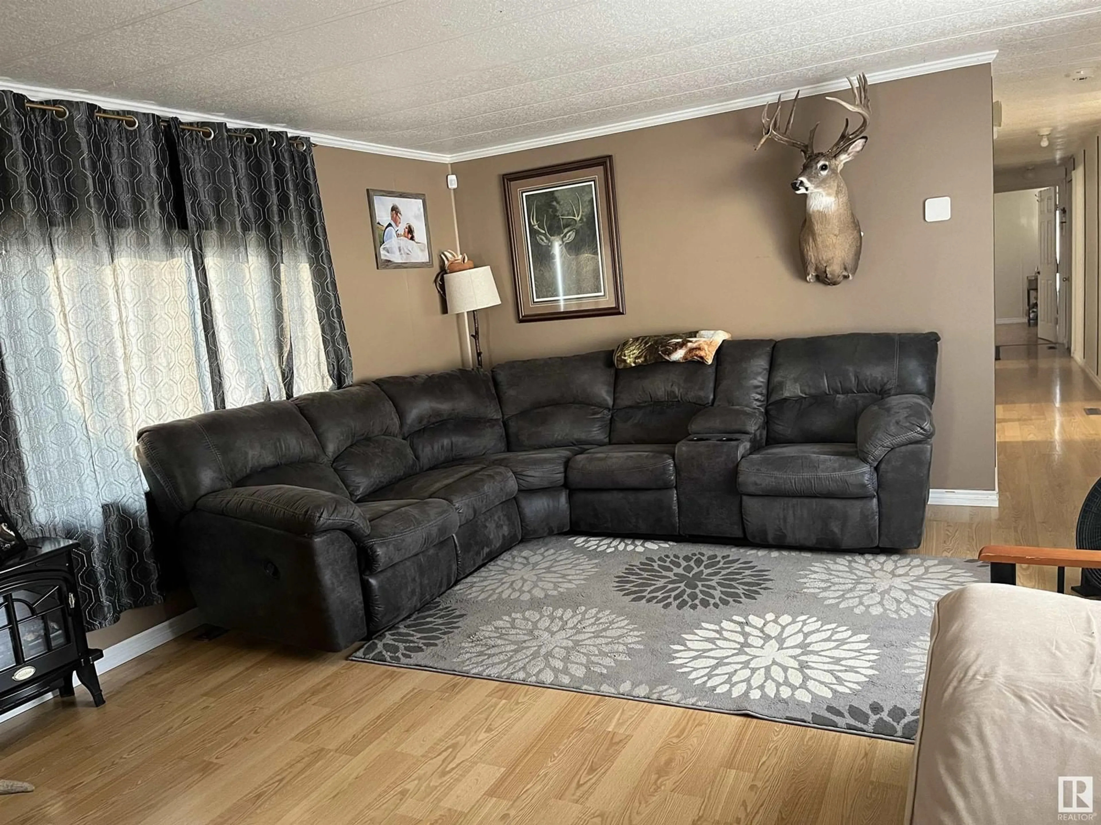 Living room, carpet floors for 18 Sportsman Trailer Park, Bonnyville Town Alberta T9N2H6