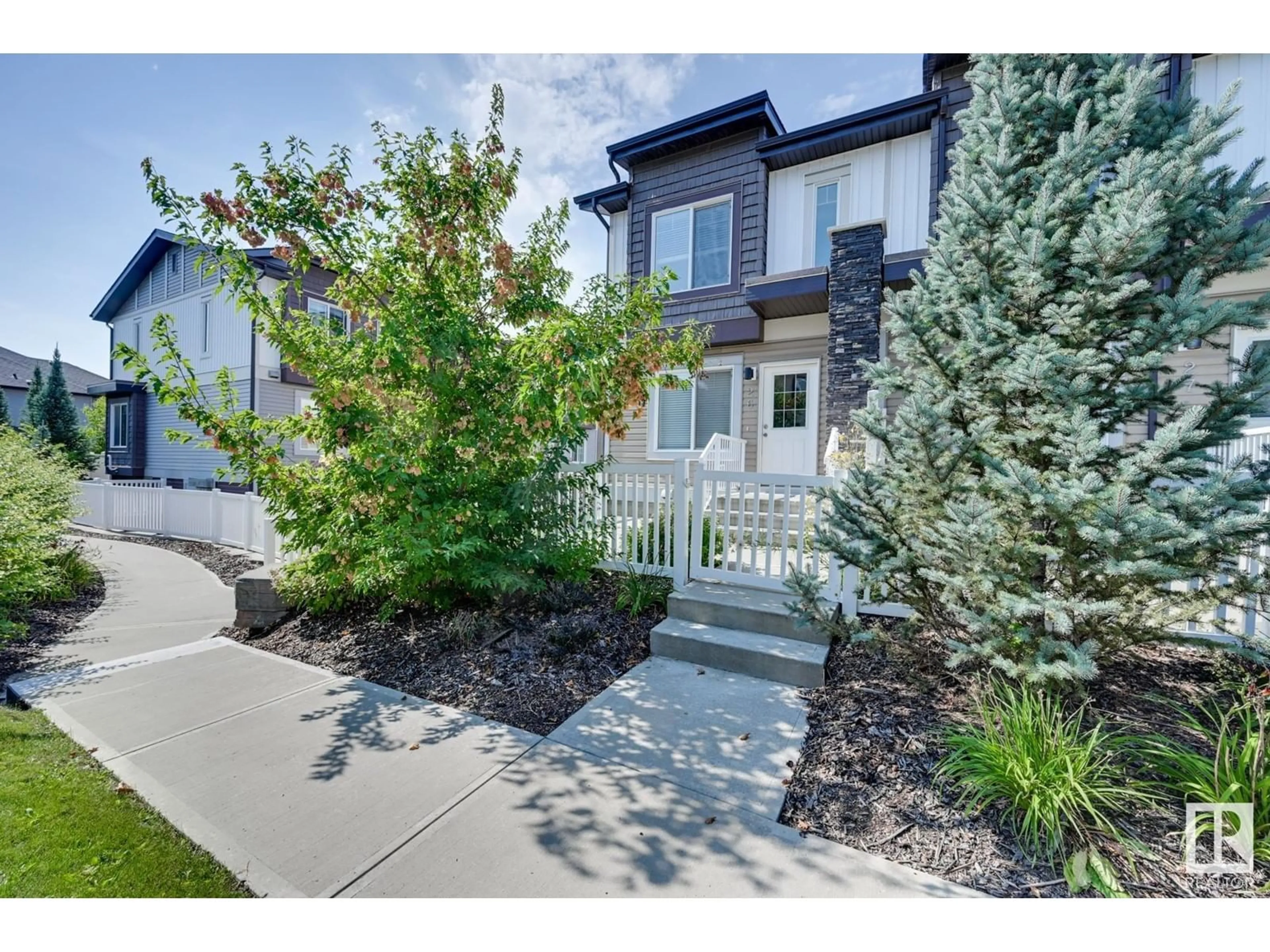 A pic from exterior of the house or condo, the street view for #26 2215 24 ST NW, Edmonton Alberta T6T1A6