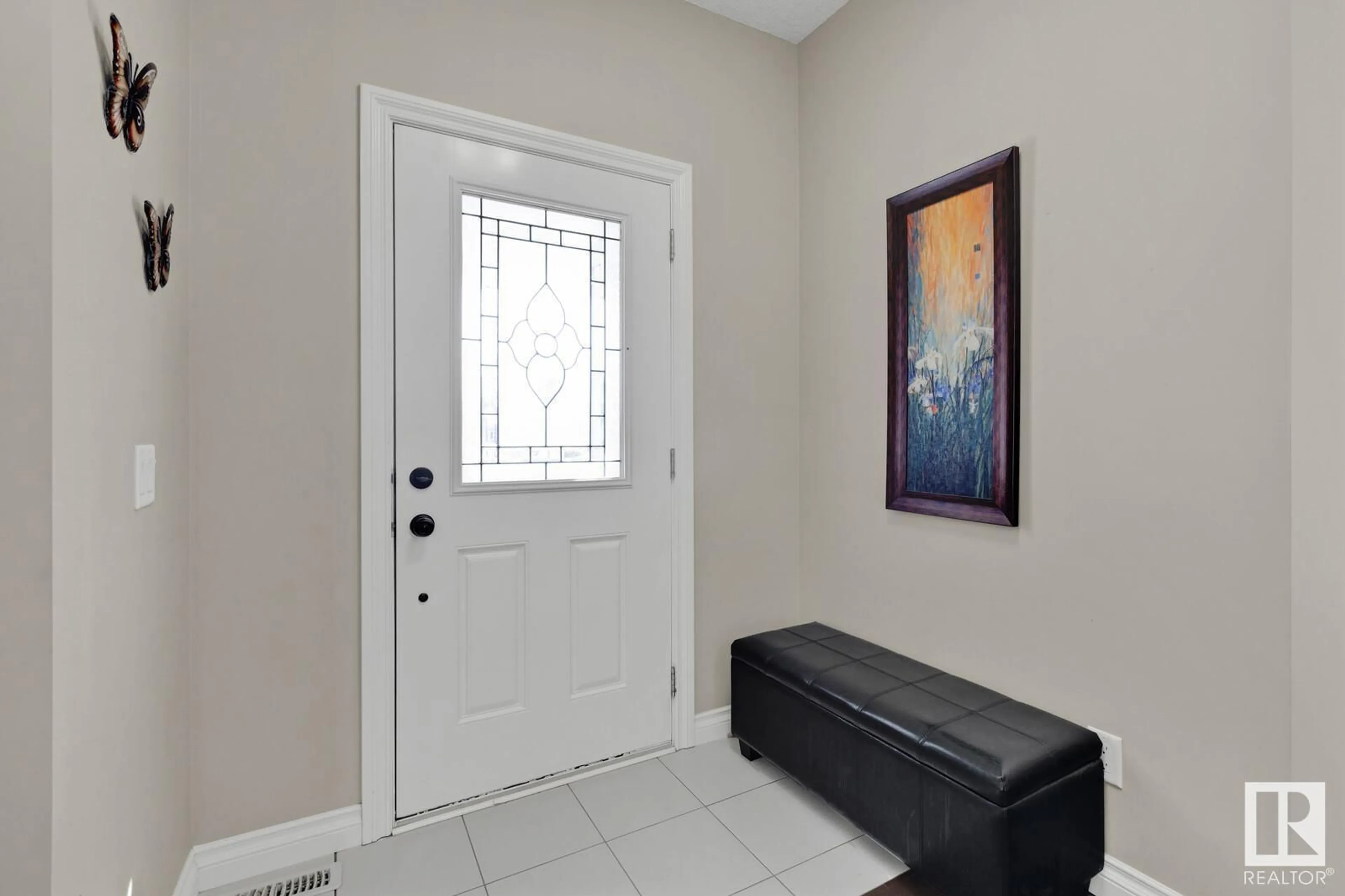 Indoor entryway, cement floor for 8928 23 AV SW, Edmonton Alberta T6X2C3