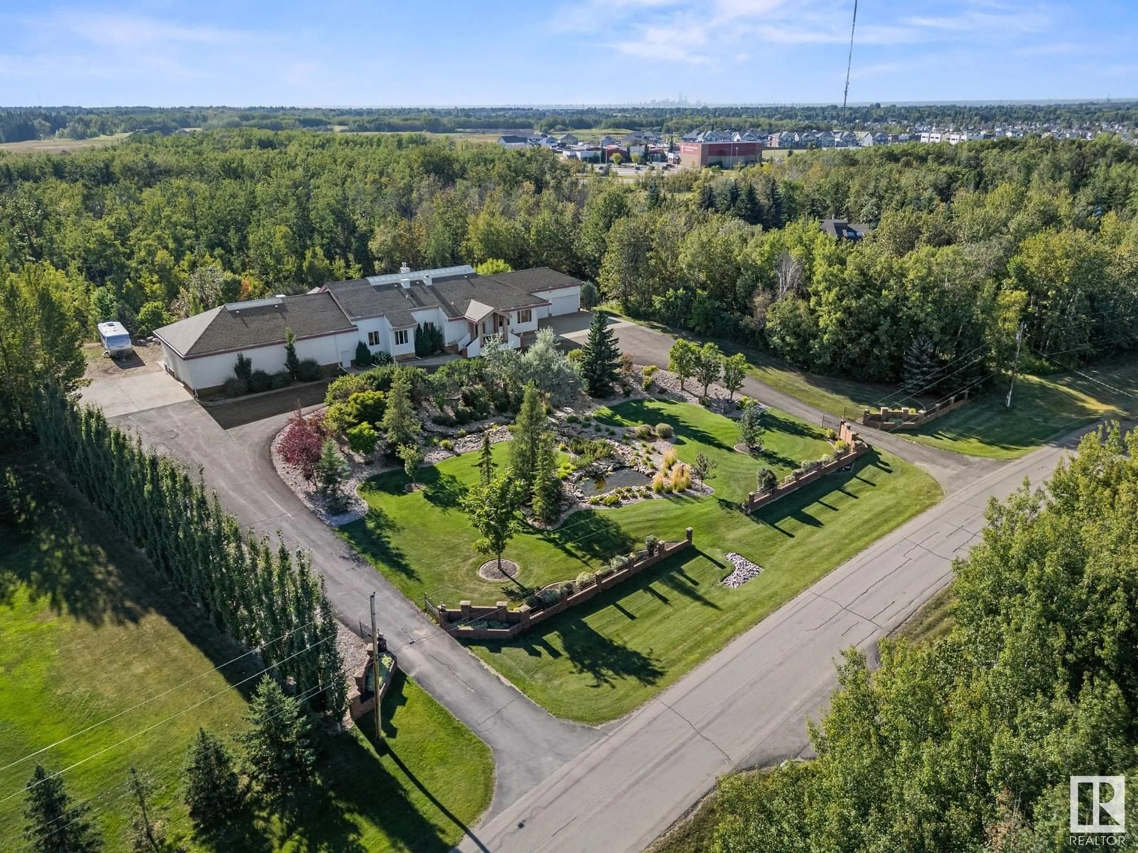 A pic from exterior of the house or condo, the fenced backyard for #397 52319 RGE ROAD 231, Rural Strathcona County Alberta T8B1A8