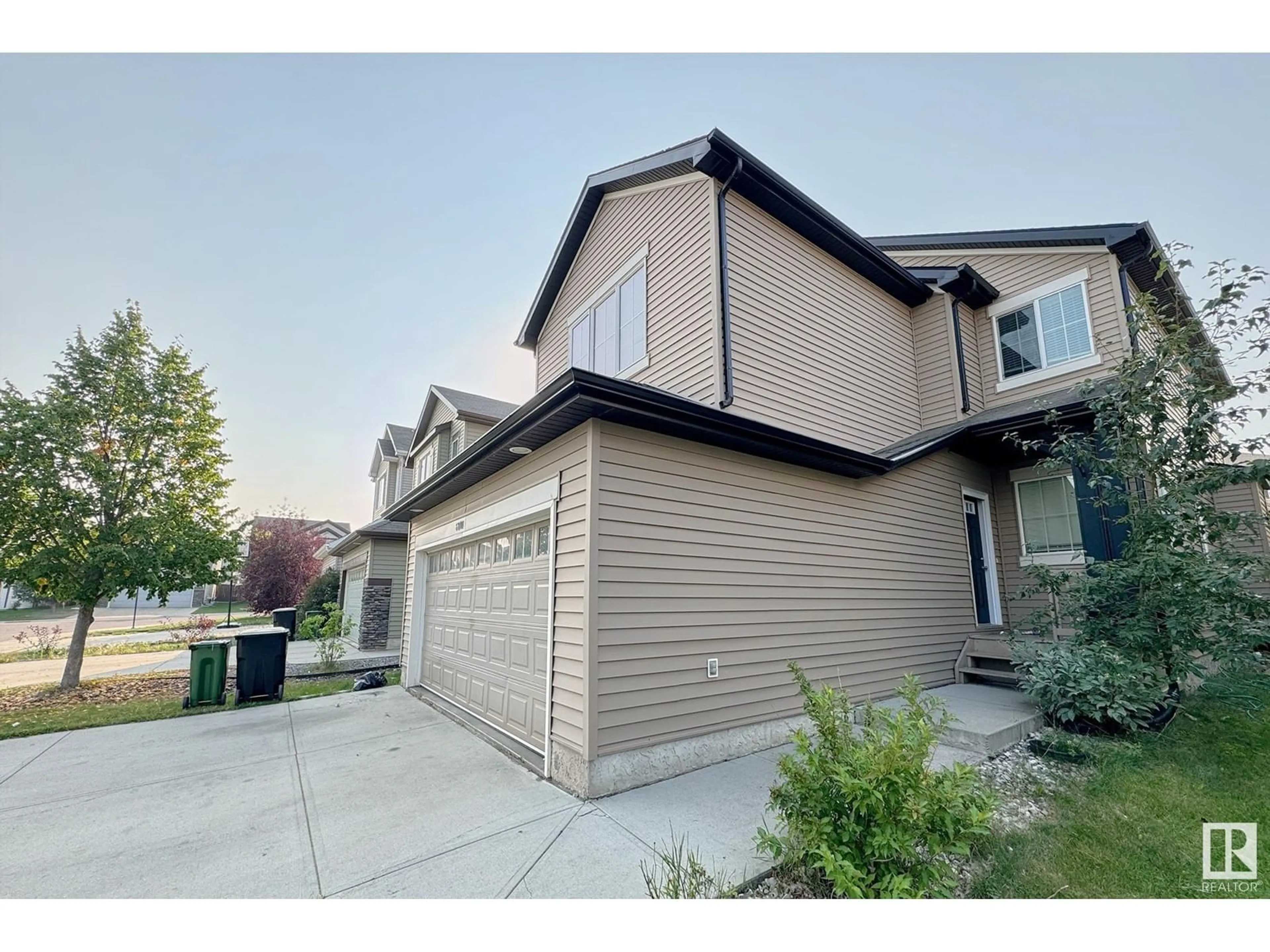 A pic from exterior of the house or condo, the street view for 6111 11 AV SW, Edmonton Alberta T6X0M4