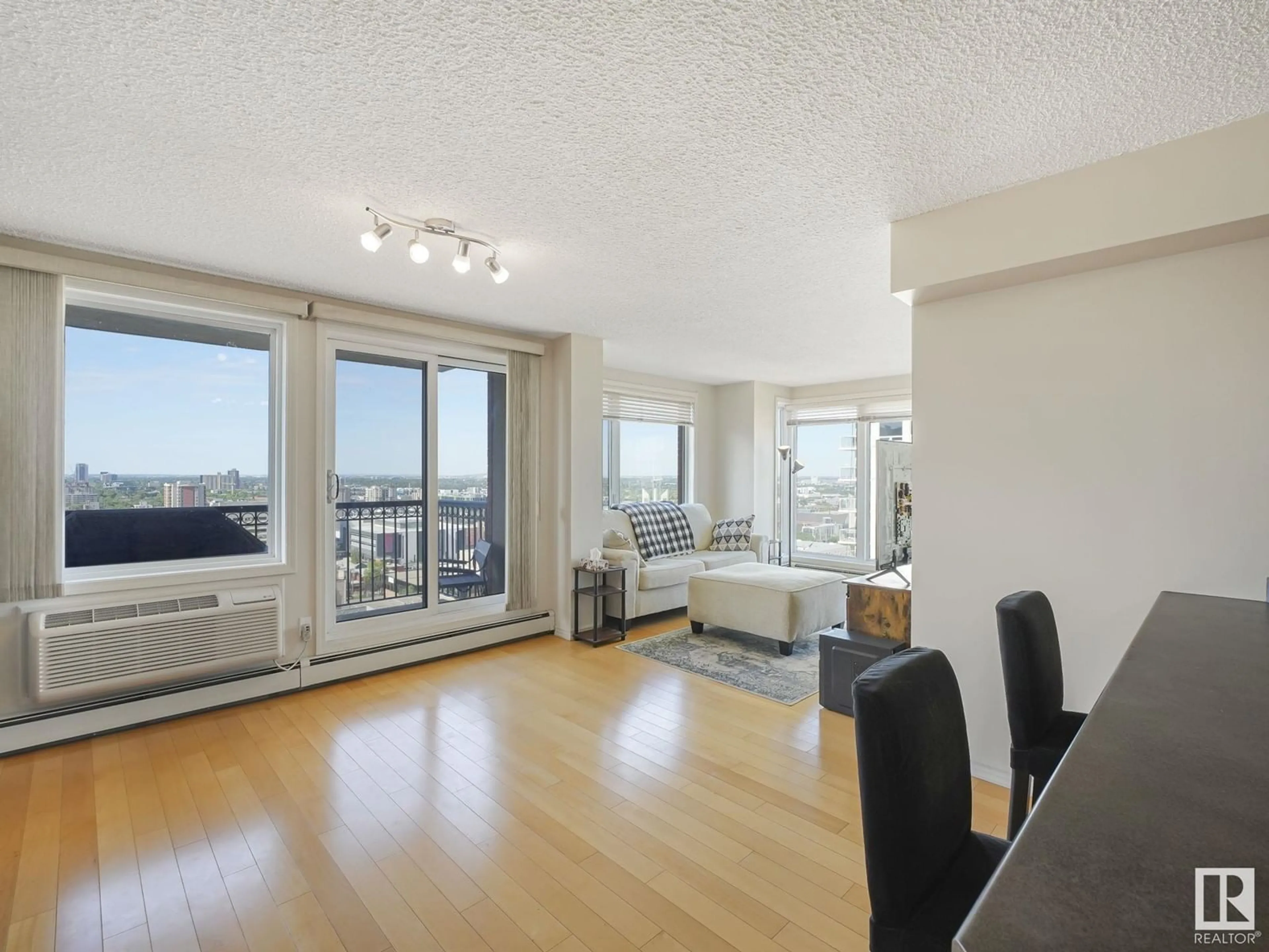 A pic of a room, wood floors for #2008 10180 104 ST NW, Edmonton Alberta T5J1A7