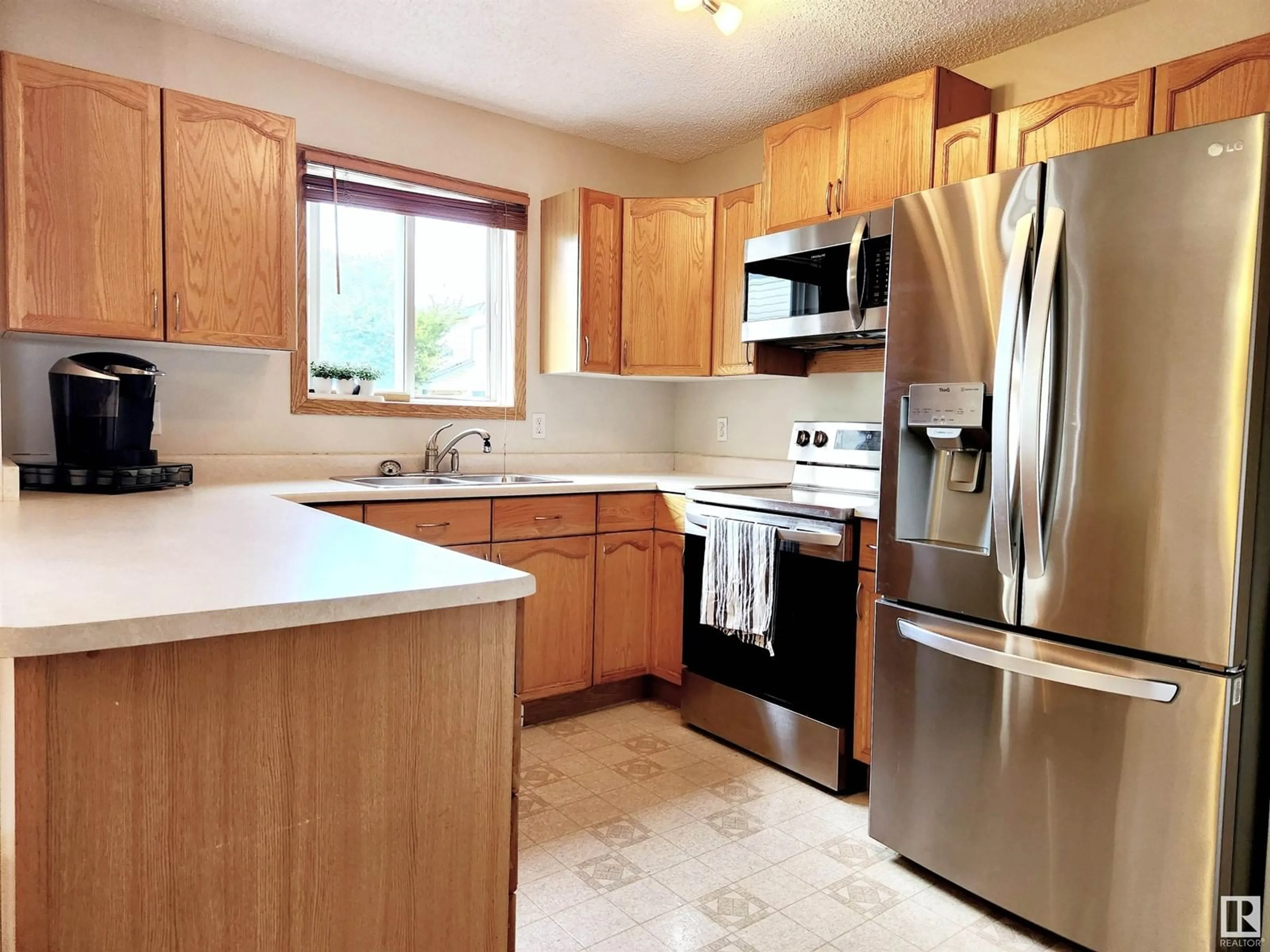 Standard kitchen, wood floors for #71 10909 106 ST NW, Edmonton Alberta T5H4M7