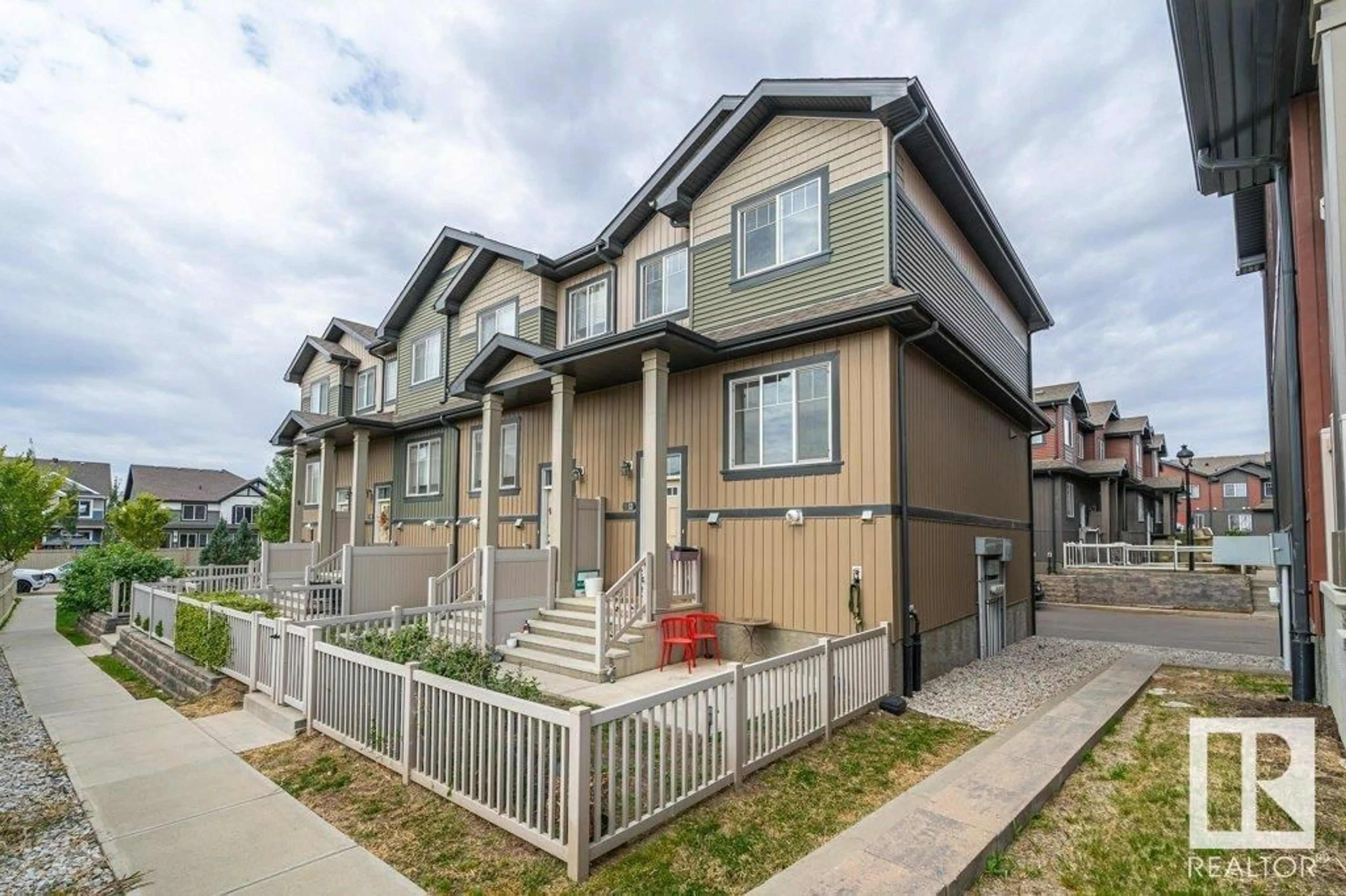 A pic from exterior of the house or condo for #12 3305 ORCHARDS LI SW, Edmonton Alberta T6X2H1