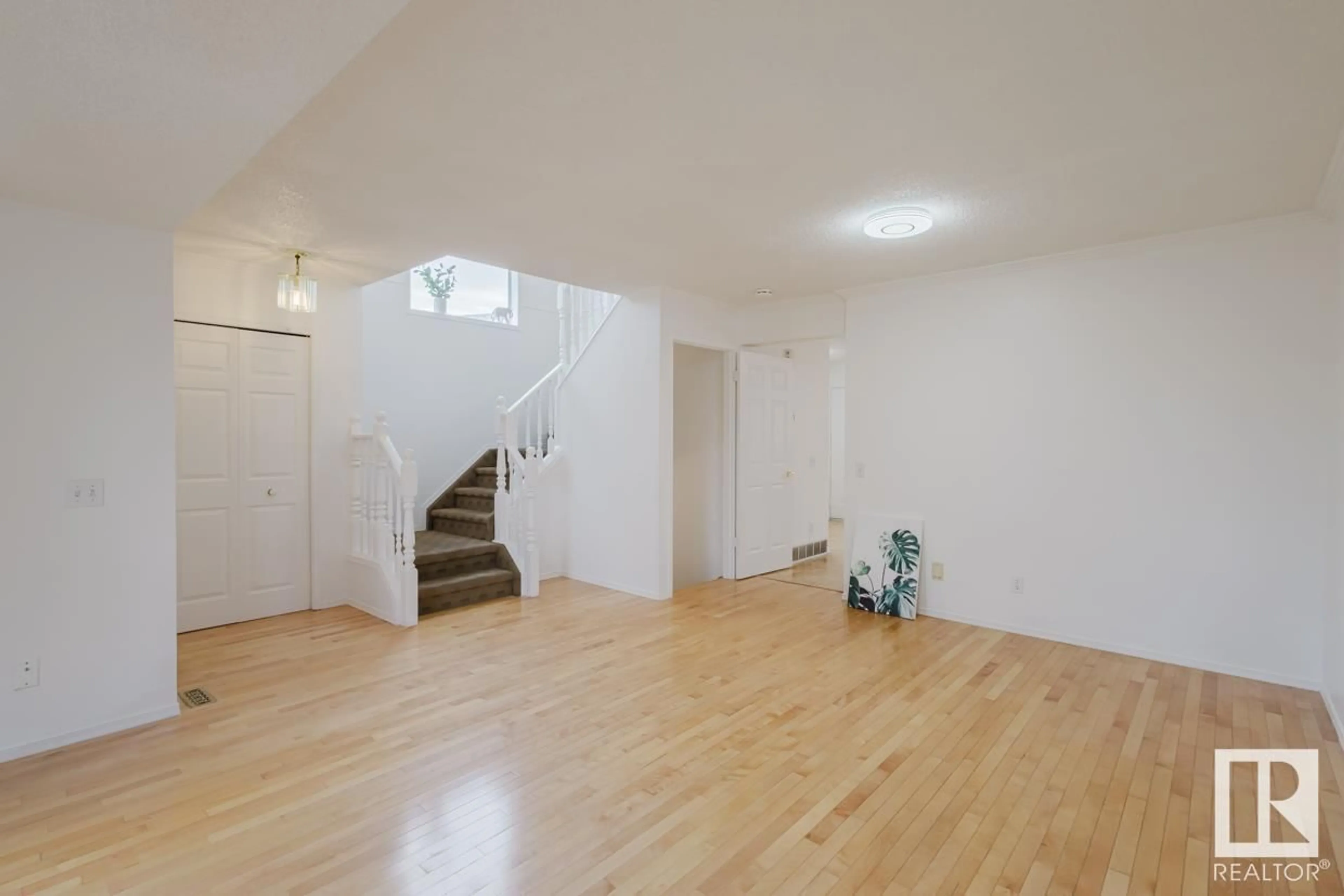 A pic of a room, wood floors for 8021 17A AV NW, Edmonton Alberta T6K4E1