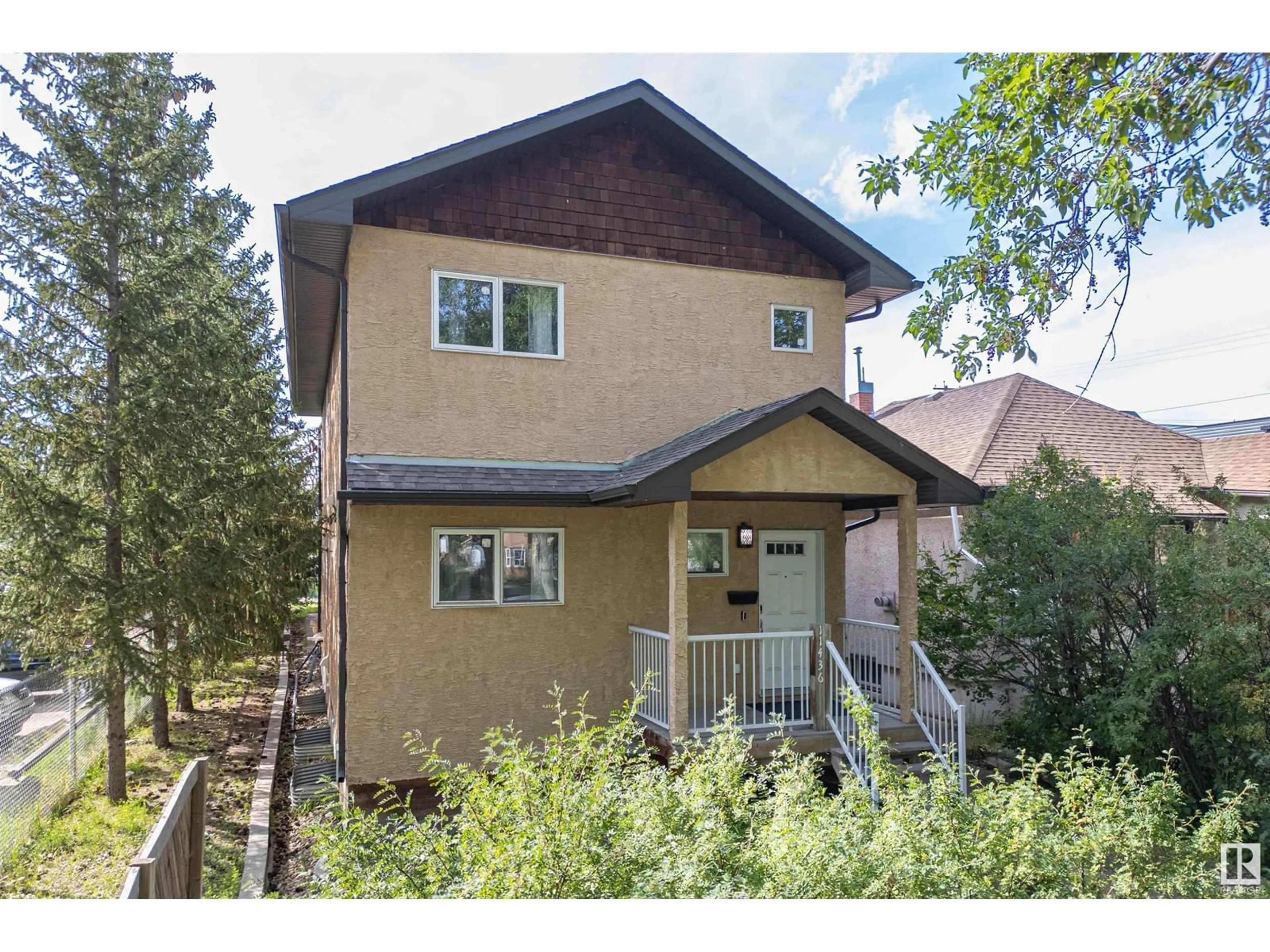 Frontside or backside of a home for 11436 97 ST NW, Edmonton Alberta T5G1X5