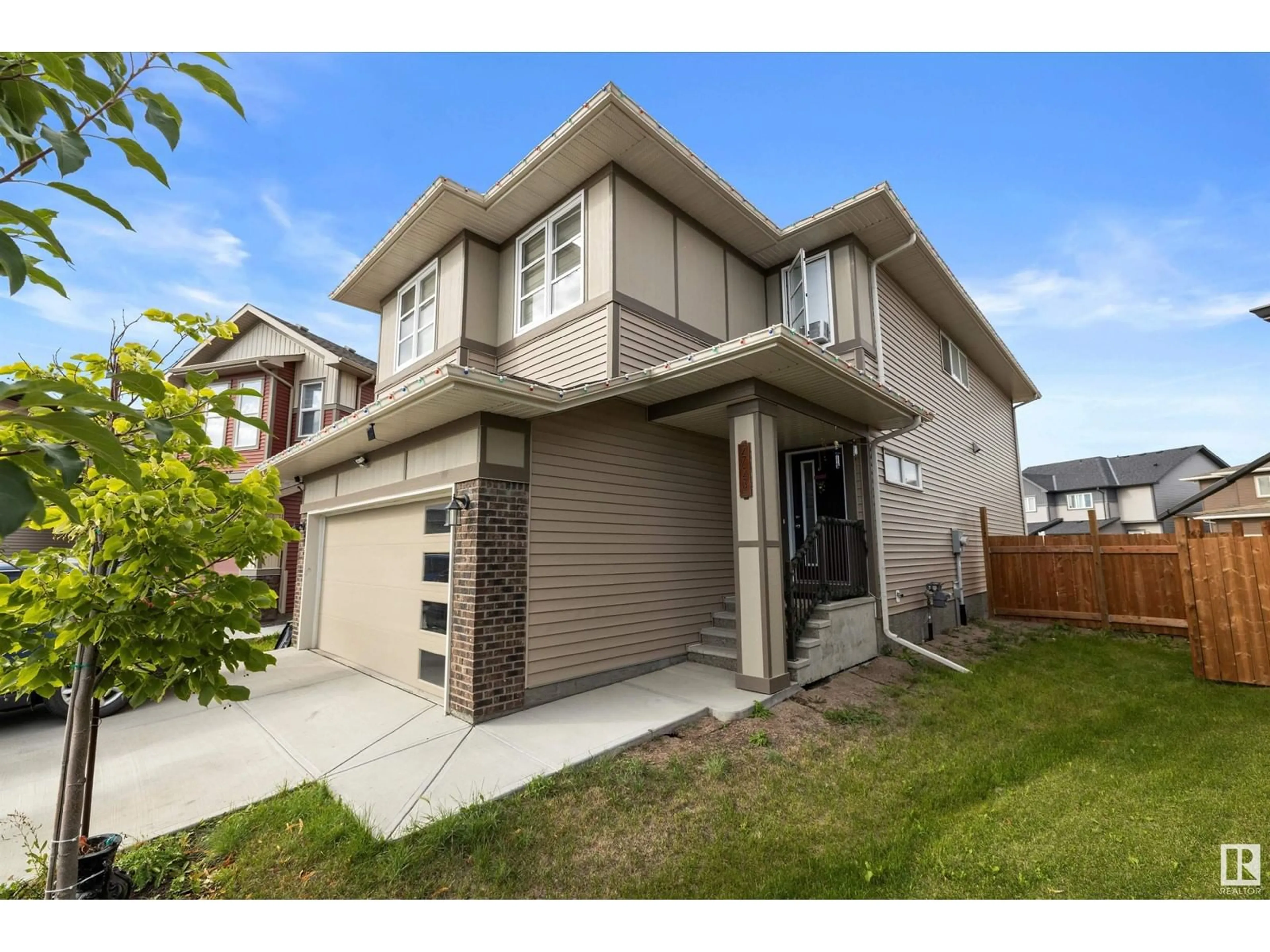 Frontside or backside of a home, the fenced backyard for 2723 Collins Cres SW, Edmonton Alberta T6W3X4